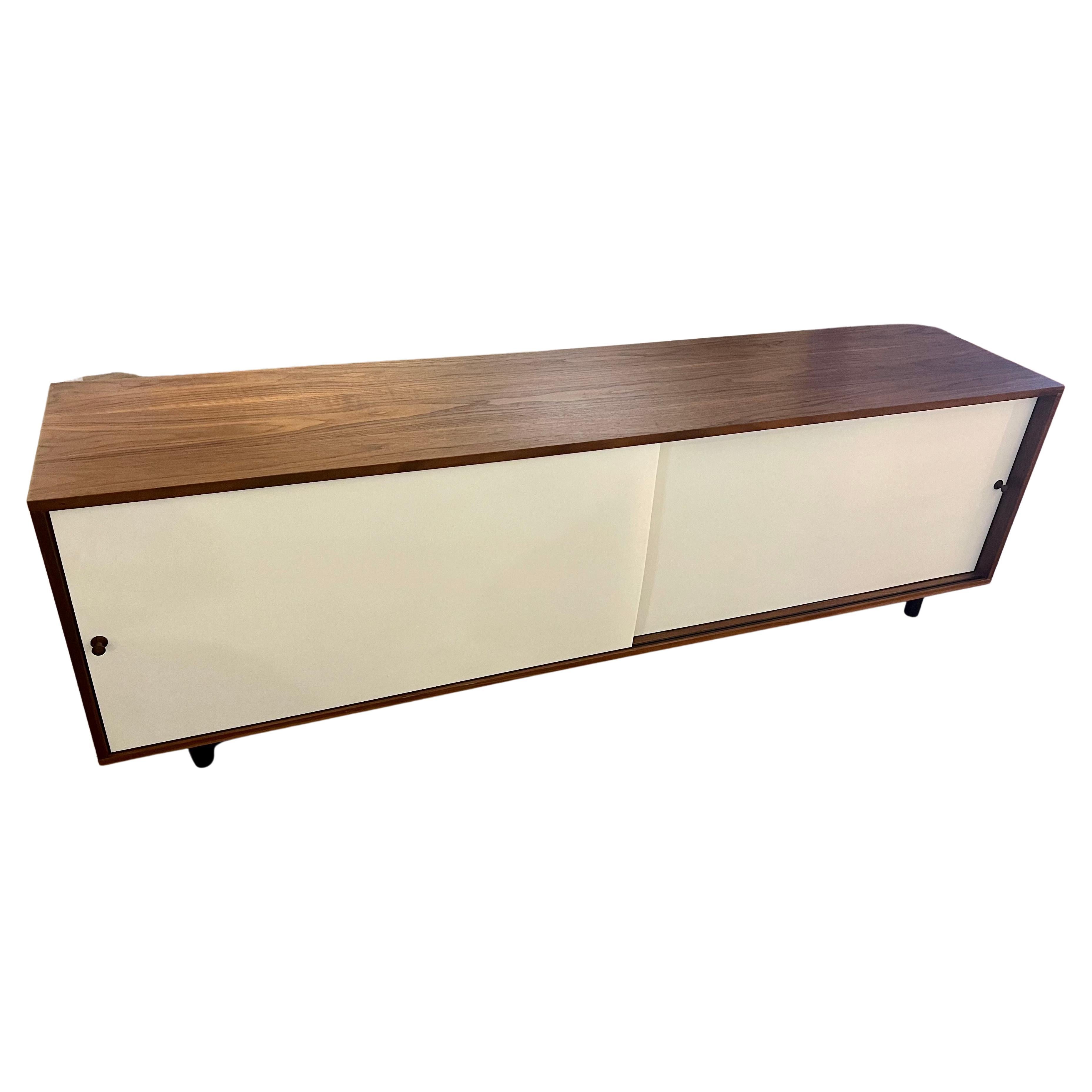 Very cool dramatic contemporary walnut case credenza with plastic doors and colorful drawers, custom-made with black piping metal legs.