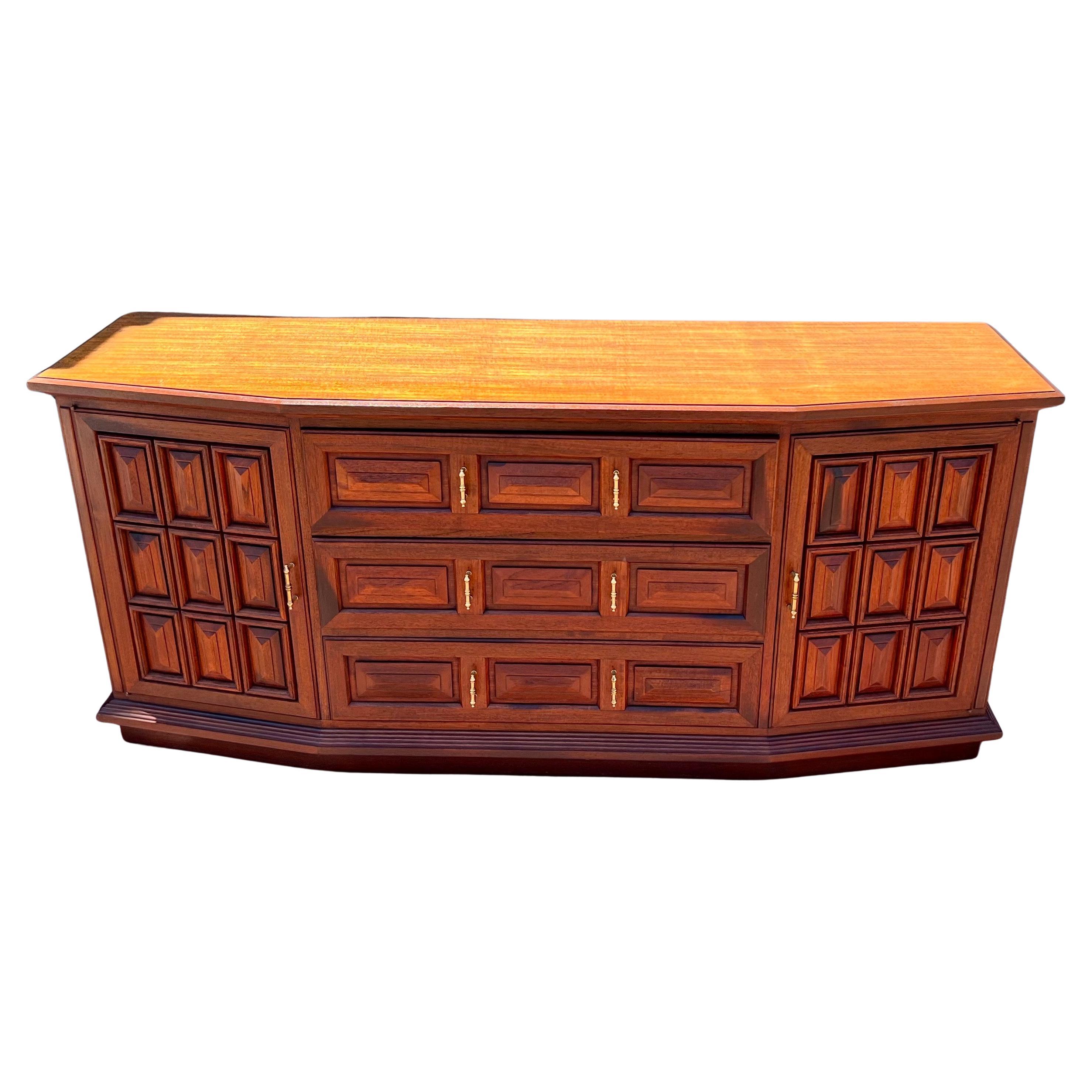 Beautiful long great quality walnut credenza with brass handles , circa 1970's we have cleaned and oiled the piece its in very nice condition elegant versatile , dove tail drawers tufted pillow front , lots of storage great for Danish modern ,