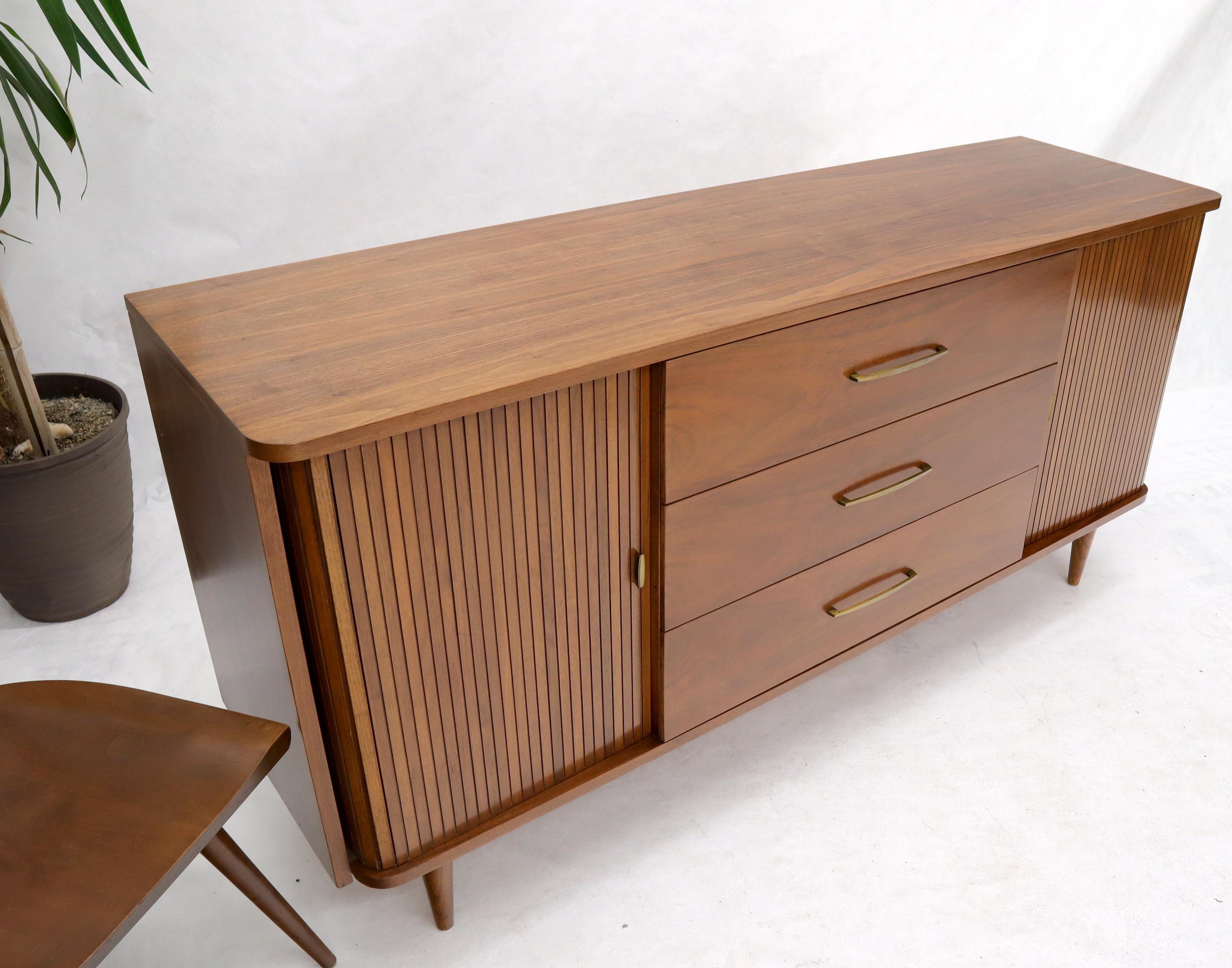 Medium light walnut tambour doors long dresser credenza.