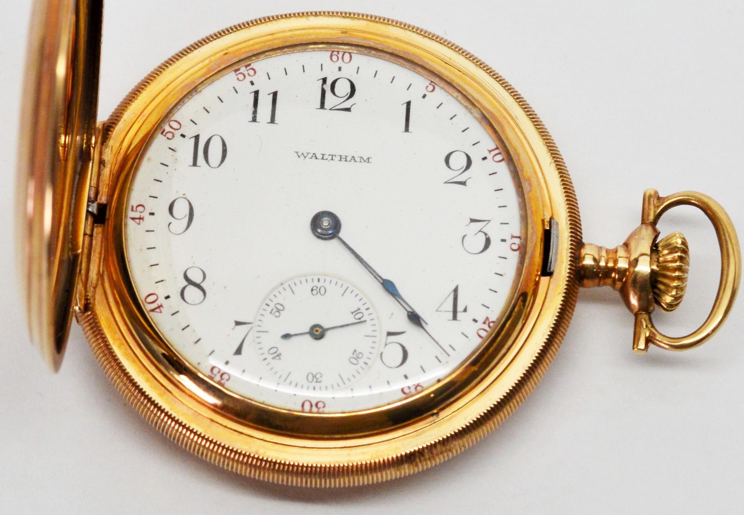 Circa 1913, American Waltham & Company 52mm fourteen karat 14K yellow gold pocket watch with hunting case model number 1908. Medallion style engraved design. Fifteen jeweled, grade 620 acid etched movement.  3/4 plate breguet movement number