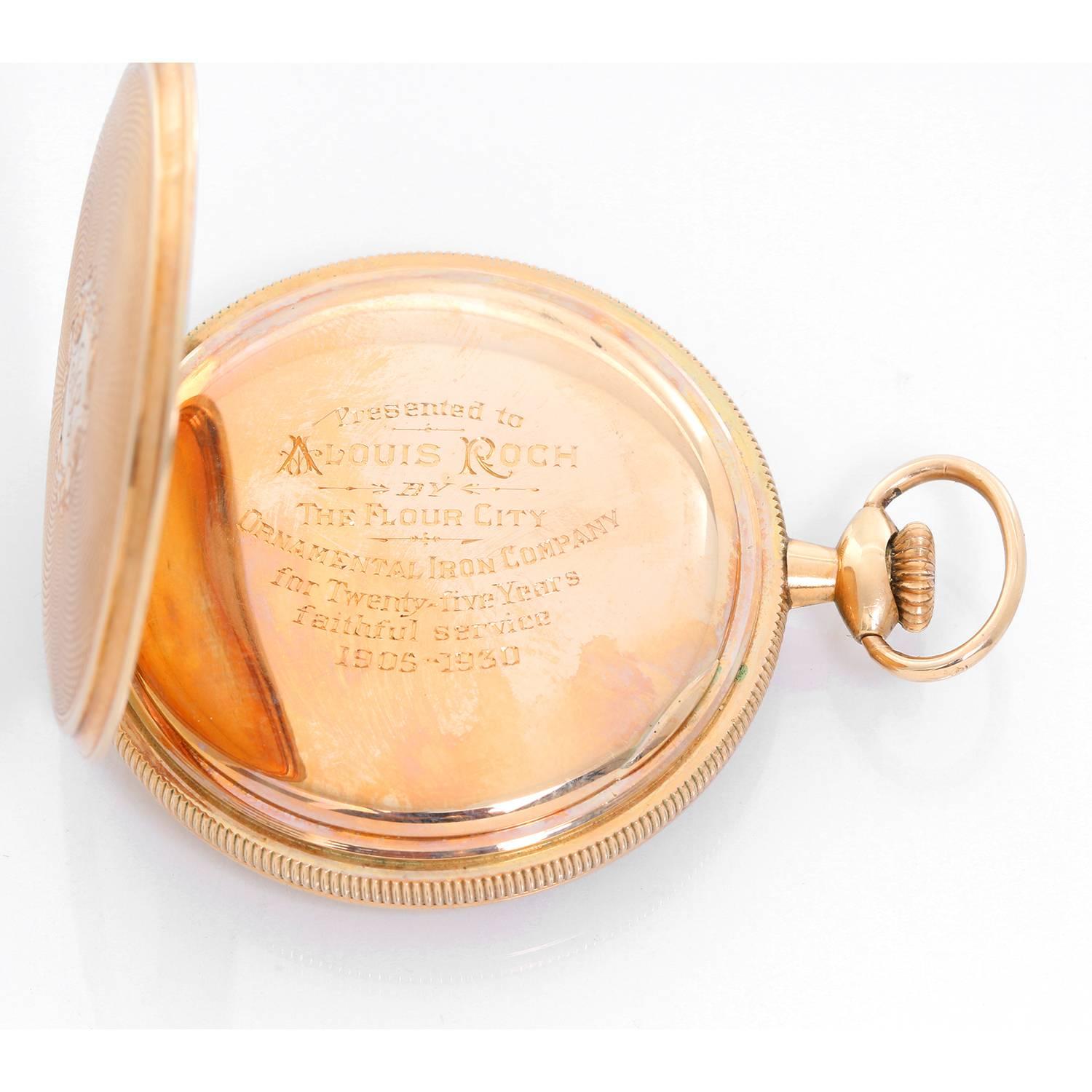 American Watch Co. Waltham 14K Yellow Gold Pocket Watch -  Manual winding; 17 jewels.  14K Yellow Gold solid case  with an engraved R in the caseback. Inside case engraved 