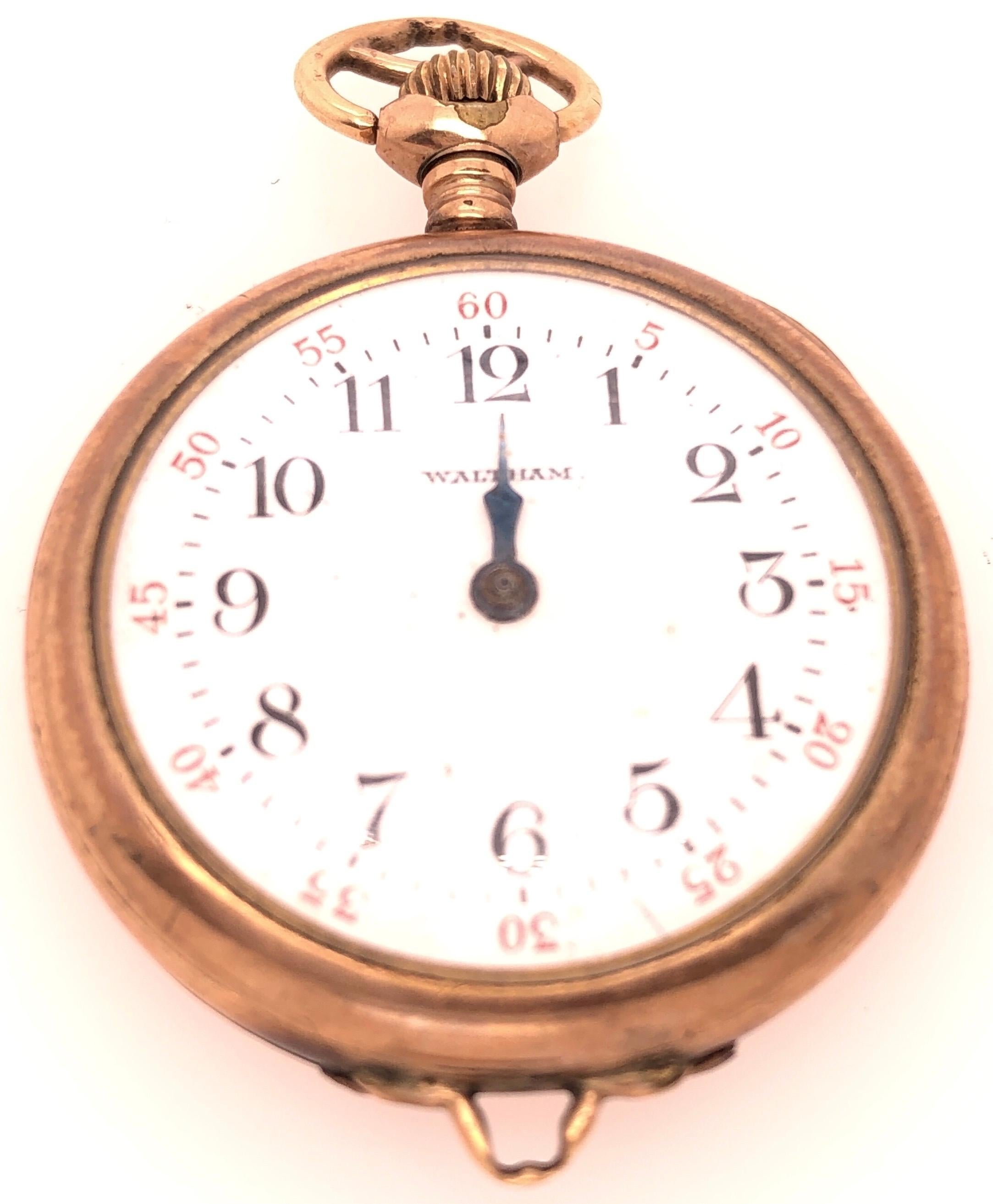 American Watch Co. Yellow Gold Plated Waltham Pocket Watch. This watch is marked Warranted. This watch is in working order. 
30mm diameter