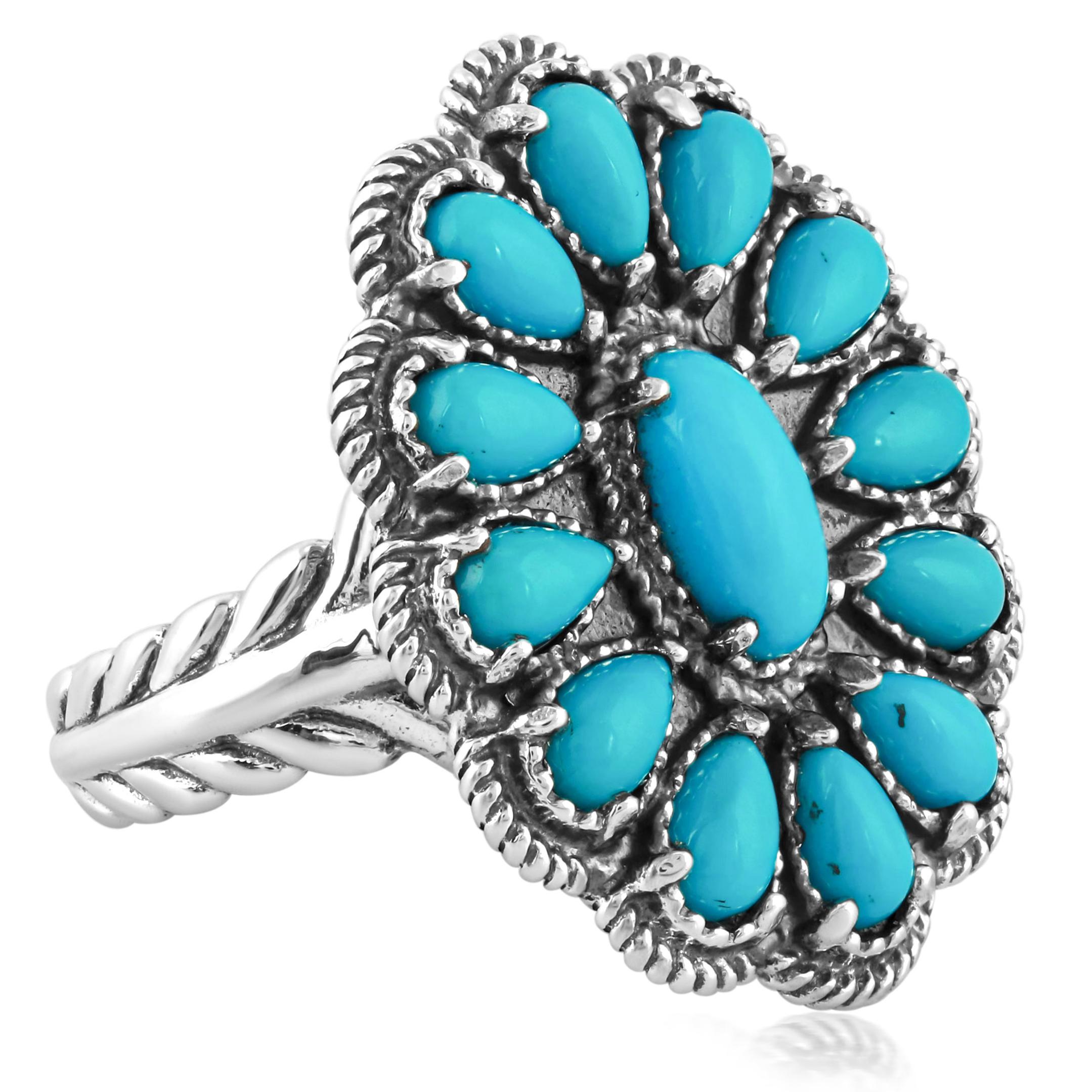 Taille ovale Bague American West en argent sterling avec fleur en turquoise bleue Tailles 5-10 en vente