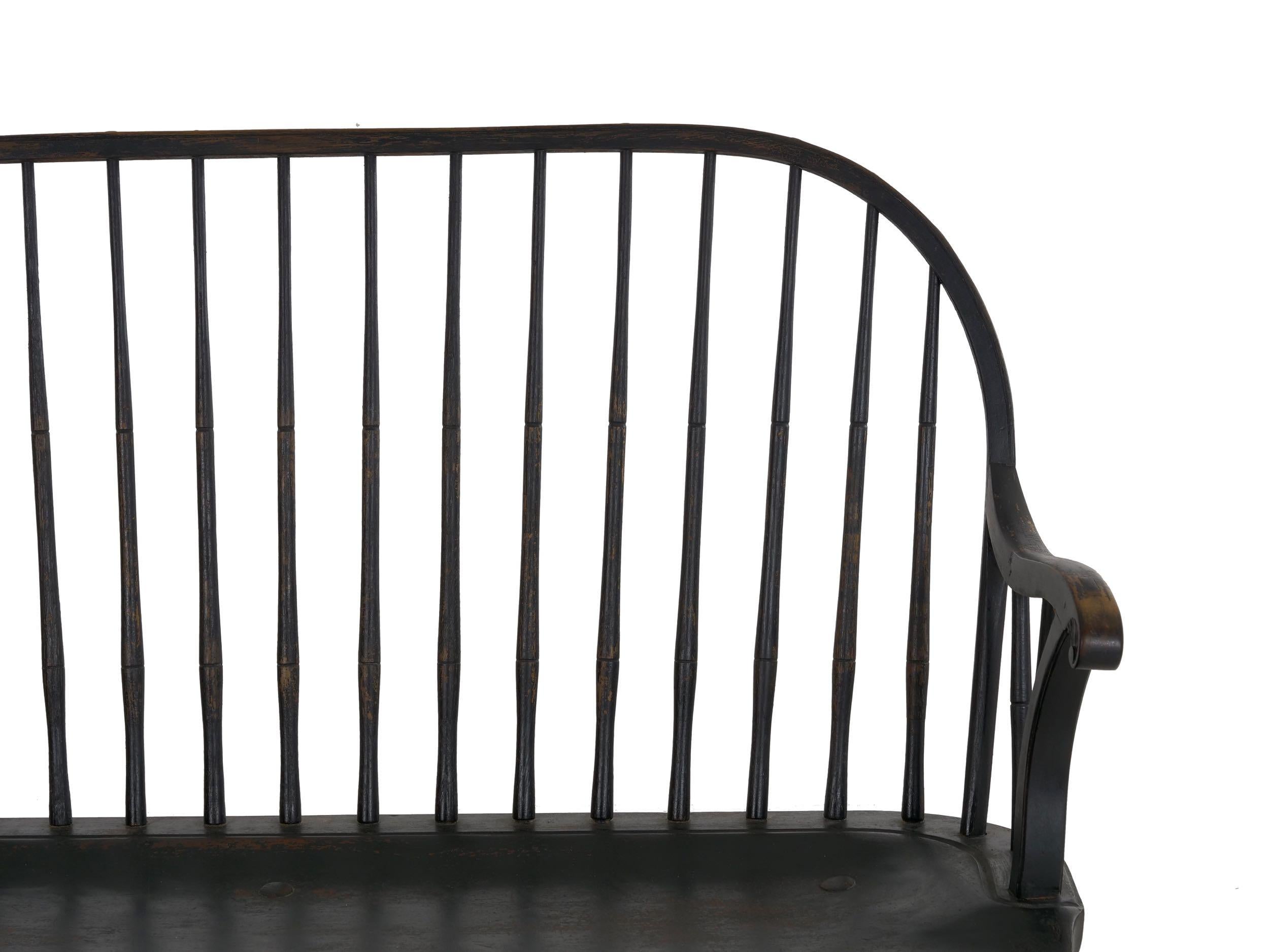 Wood American Windsor Style Black Painted Sack-Back Settee Bench, 20th Century