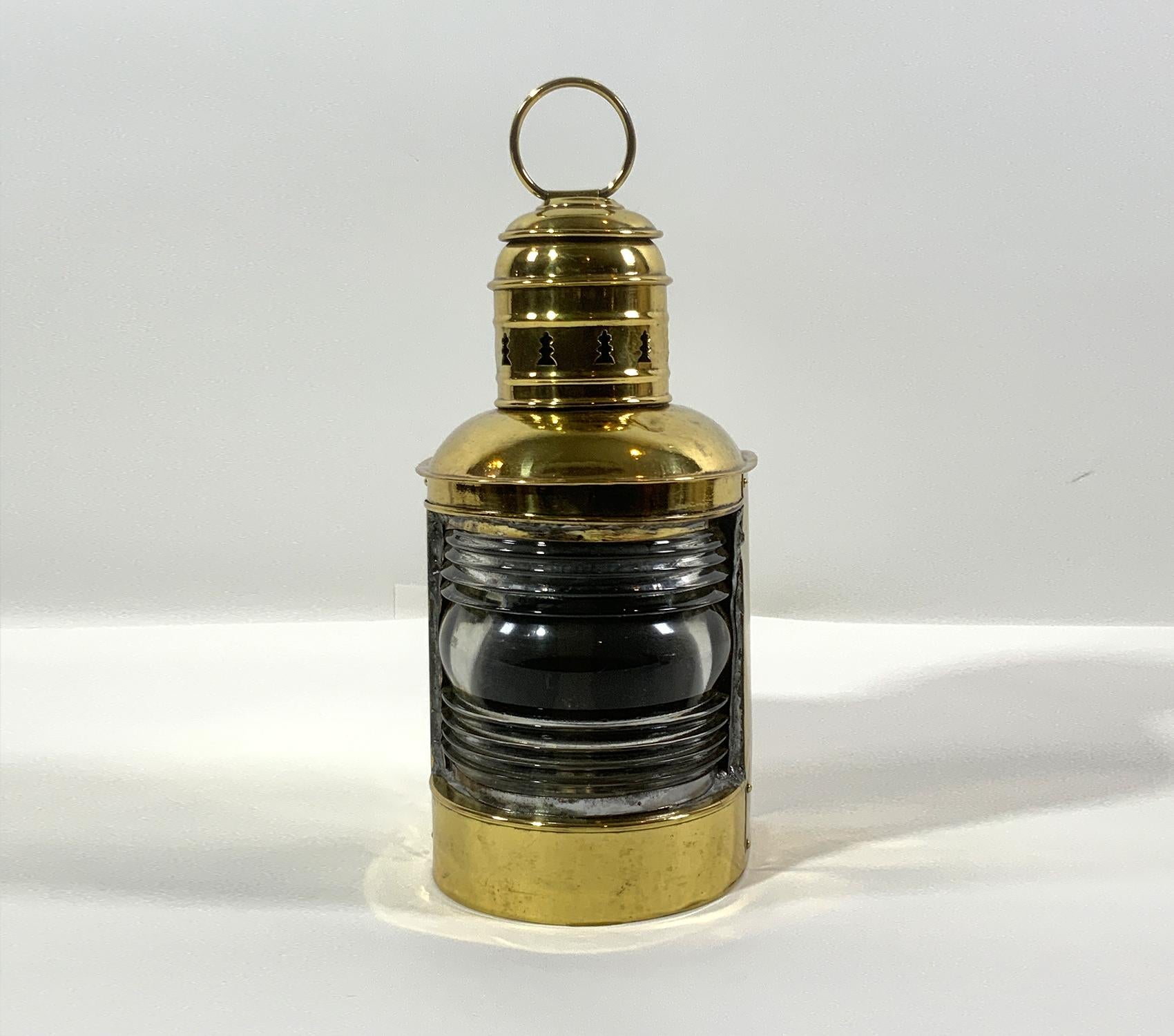 Solid brass ships masthead lantern. Polished brass with Fresnel lens. Vented top and carry ring.

Weight: 4 lbs
Overall Dimensions: 11