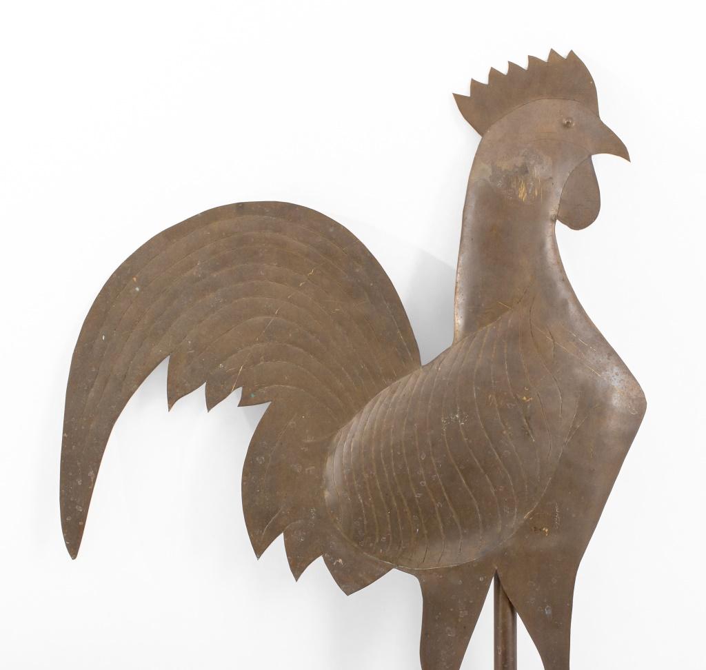 Americana Folk Art brass weathervane in the form of a rooster perched atop an arrow, with incised details. 22