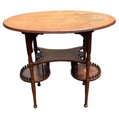 Table d'appoint ovale Americana avec deux tablettes pour jardinières