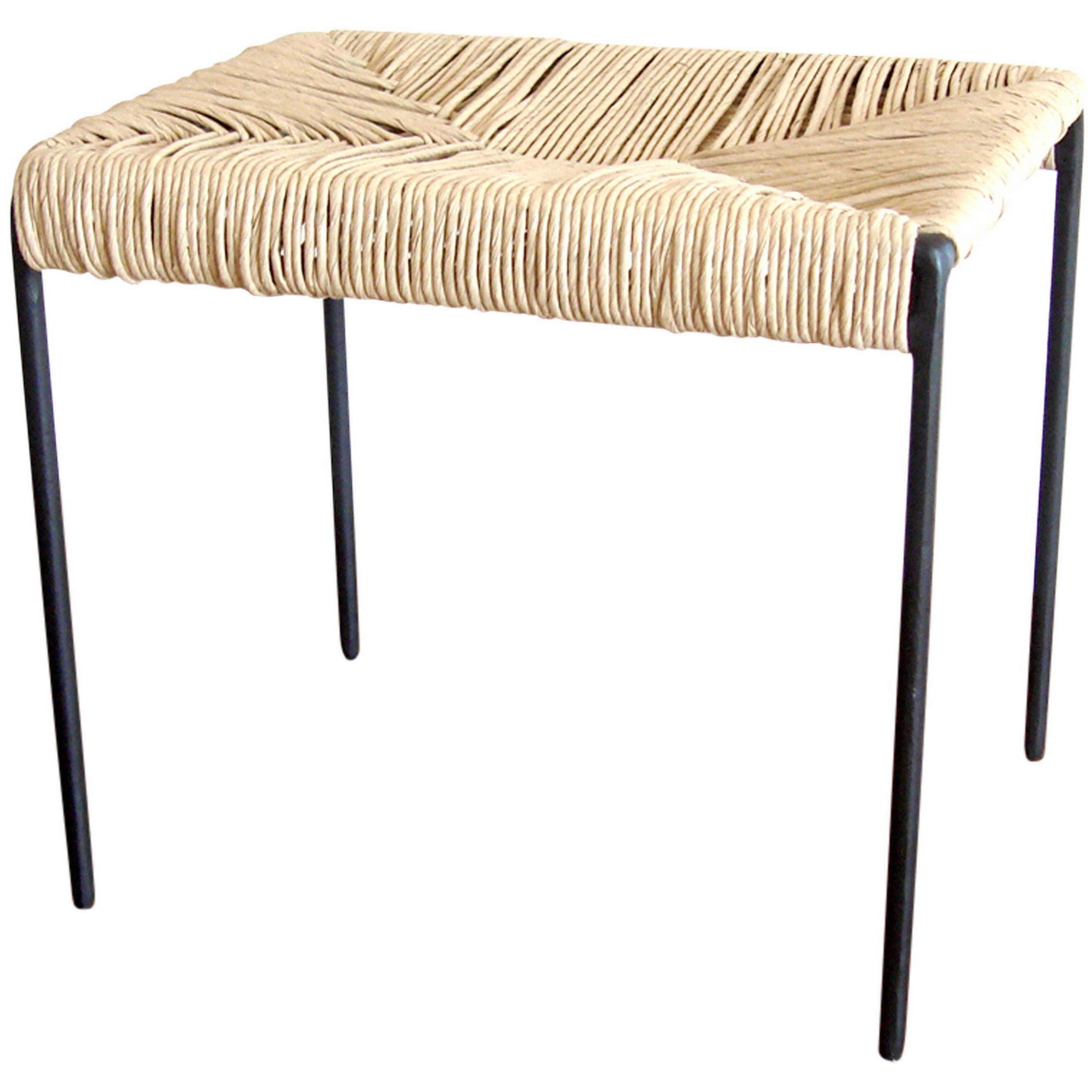 Americano woven cane and blackened steel ottoman stool For Sale