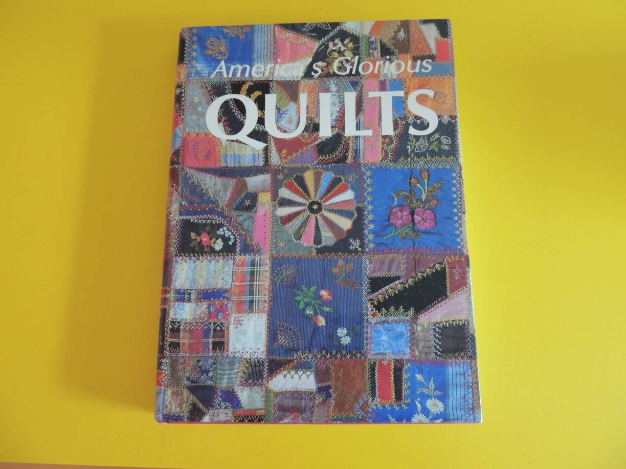 Hardcover America's quilt book with dust jacket. 320 pages. oversize book.
Size: 11