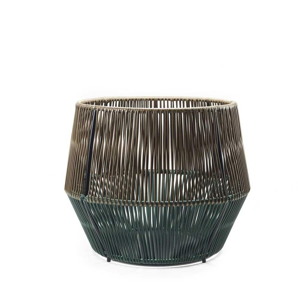 Material
Galvanized and powder coated tubular steel. PVC strings made from recycled plastic.
COLOR: terra/ moss green/ black

The Caribe Chic Basket is an elegant design by Sebastian Herkner and can be used indoors and outdoors as a storage unit or