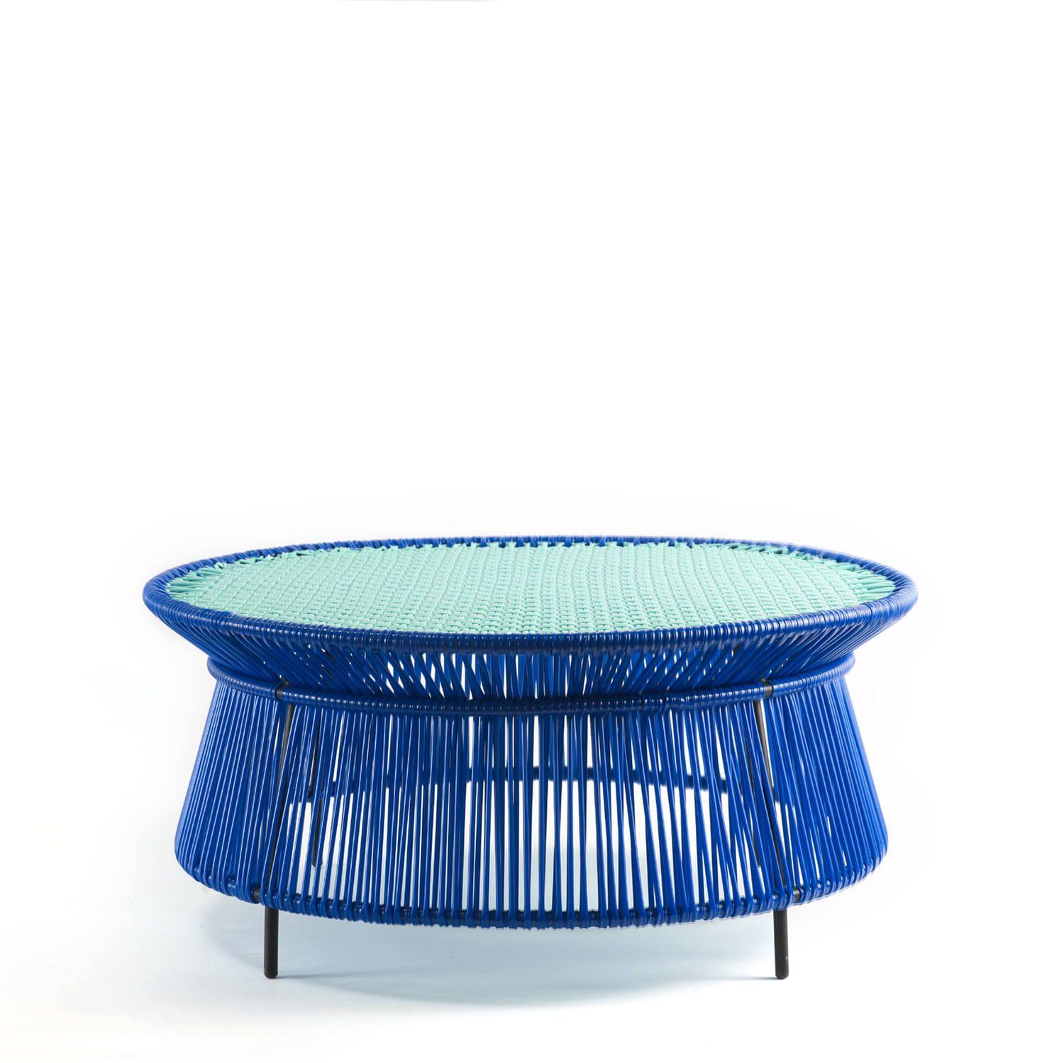 The charming Caribe Low Side Table is a colorful companion for seating arrangements inside and outdoors.It’s part of the Caribe collection, designed by Sebastian Herkner for ames. The German designer visited Colombia together with ames founder Ana