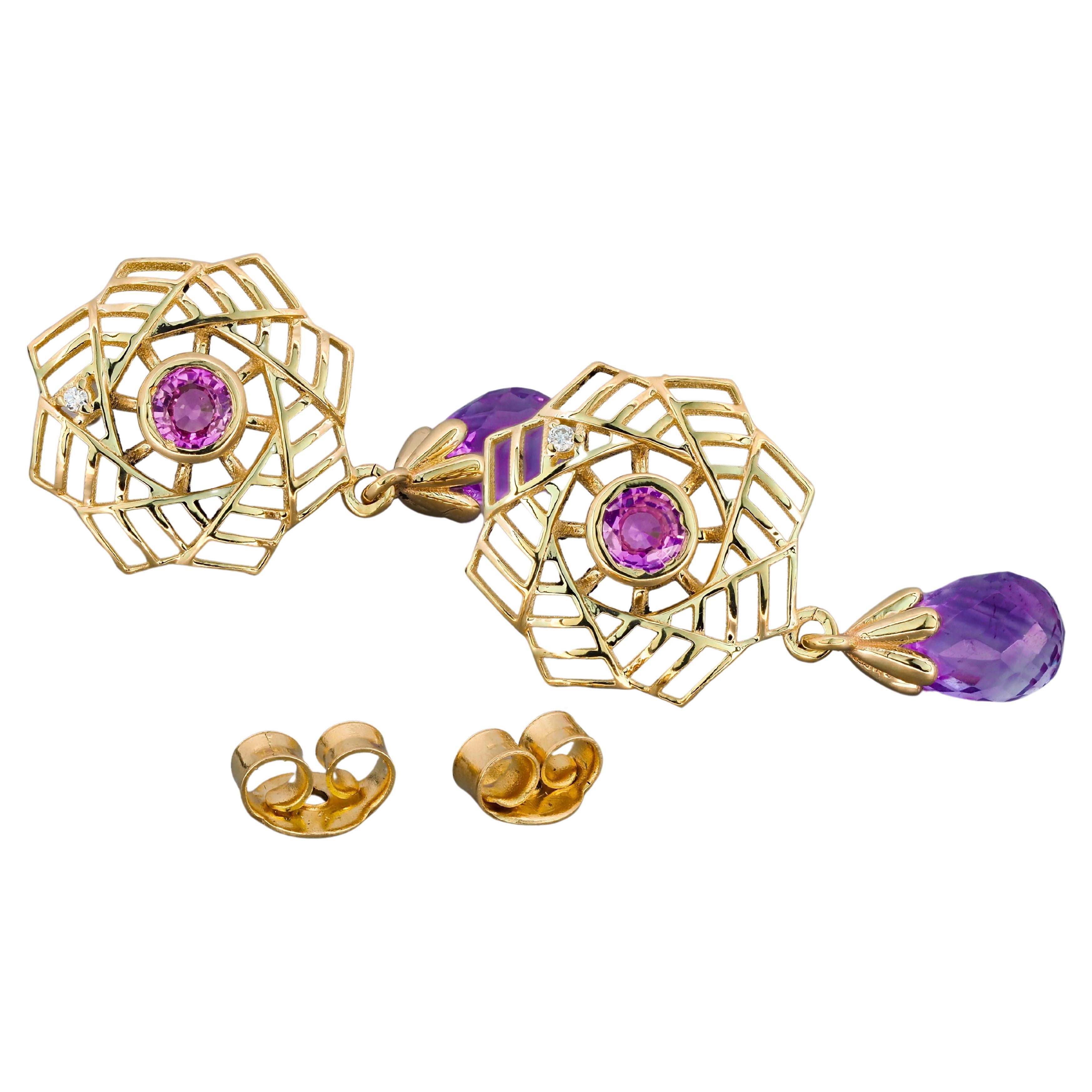 Boucles d'oreilles en or 14k avec améthyste. 