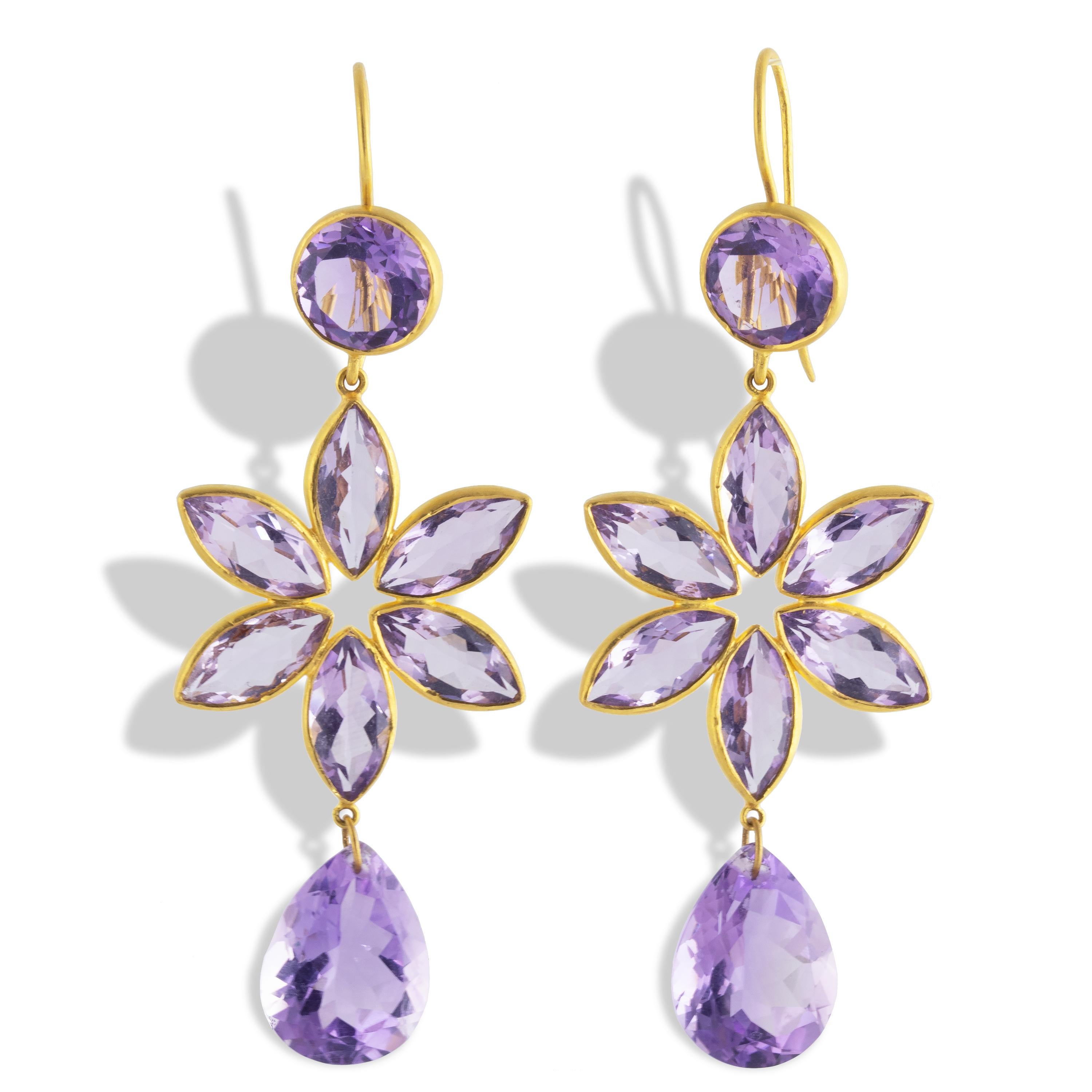 Set with 32.46 carats of radiant Brazilian Amethyst, these exquisite earrings are made with glowing, marquise, round and pear-shaped gemstones.   Set in 22k matte gold.

Amethyst served royalty throughout history and was considered in ancient times