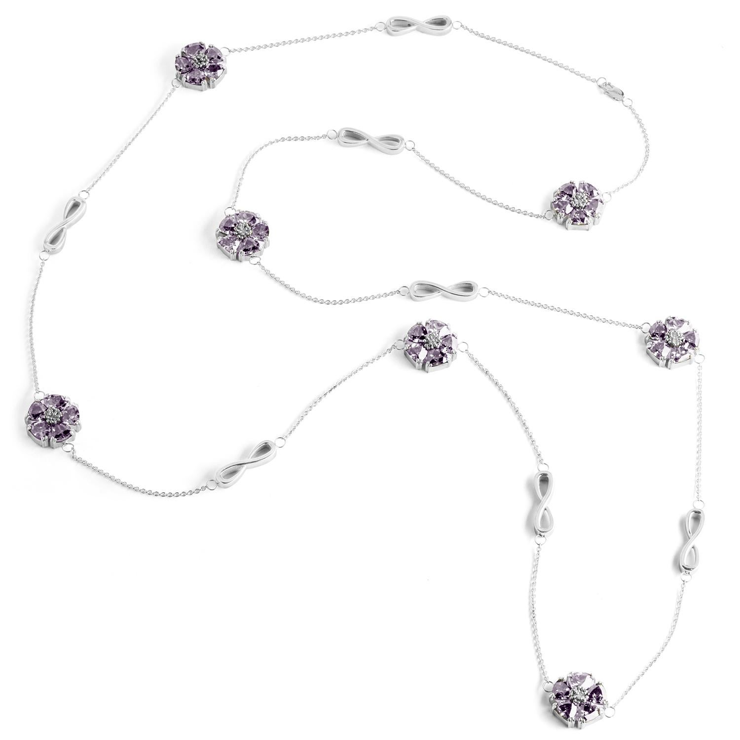 Designed in NYC

.925 Sterling Silver 15 x 7 mm Amethyst Blossom Stone and Infinity Lariat Necklace. No matter the season, allow natural beauty to surround you wherever you go. Blossom stone and infinity lariat necklace: 

Sterling silver