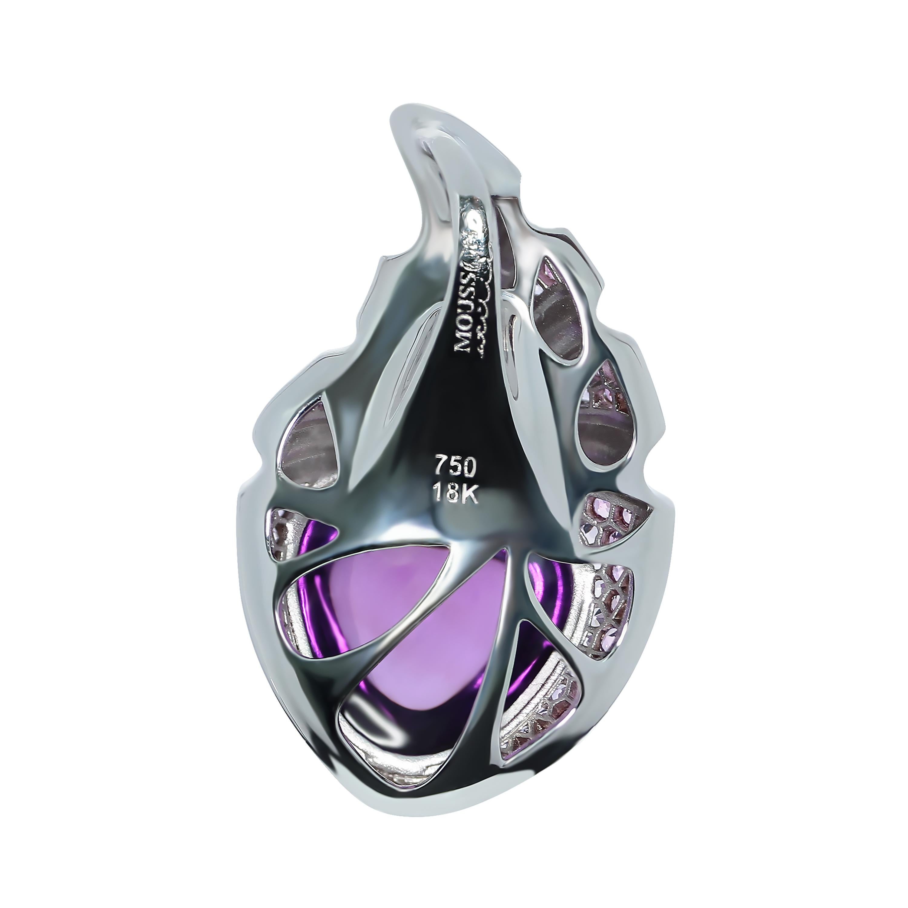 Amethyst 6.34 Carat Sapphire 18 Karat White Gold Pendant
As always, Mousson Atelier is playing with forms. Look at this incredibly stylish Pendant. It seems that 18 K White Gold literally flows like dough to the central stone, 6.34 Carat