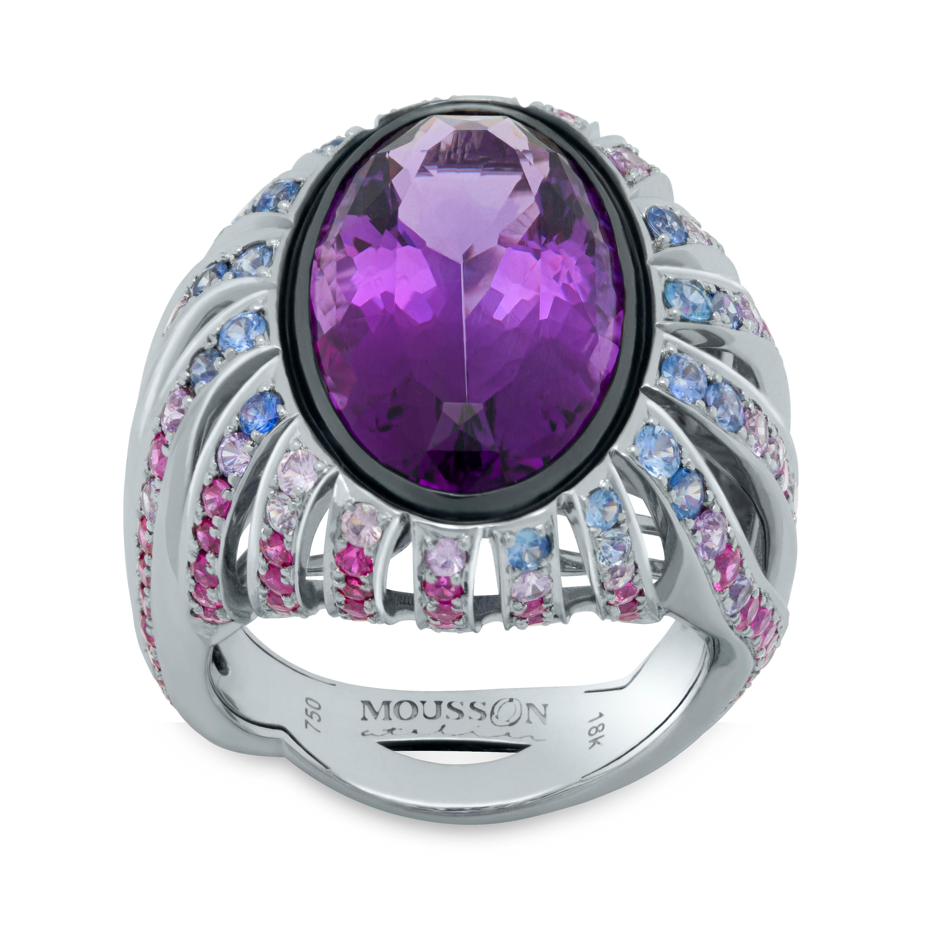Amethyst 9.02 Carat Rubies Sapphires 18 Karat White Gold New Age Ring
An incredibly bright Oval-shape 9.02 Carat Amethyst, from which many 18 Karat White Gold paths slide down, where Pink, Blue and Purple Sapphires weighing total 1.86 Carat and 100