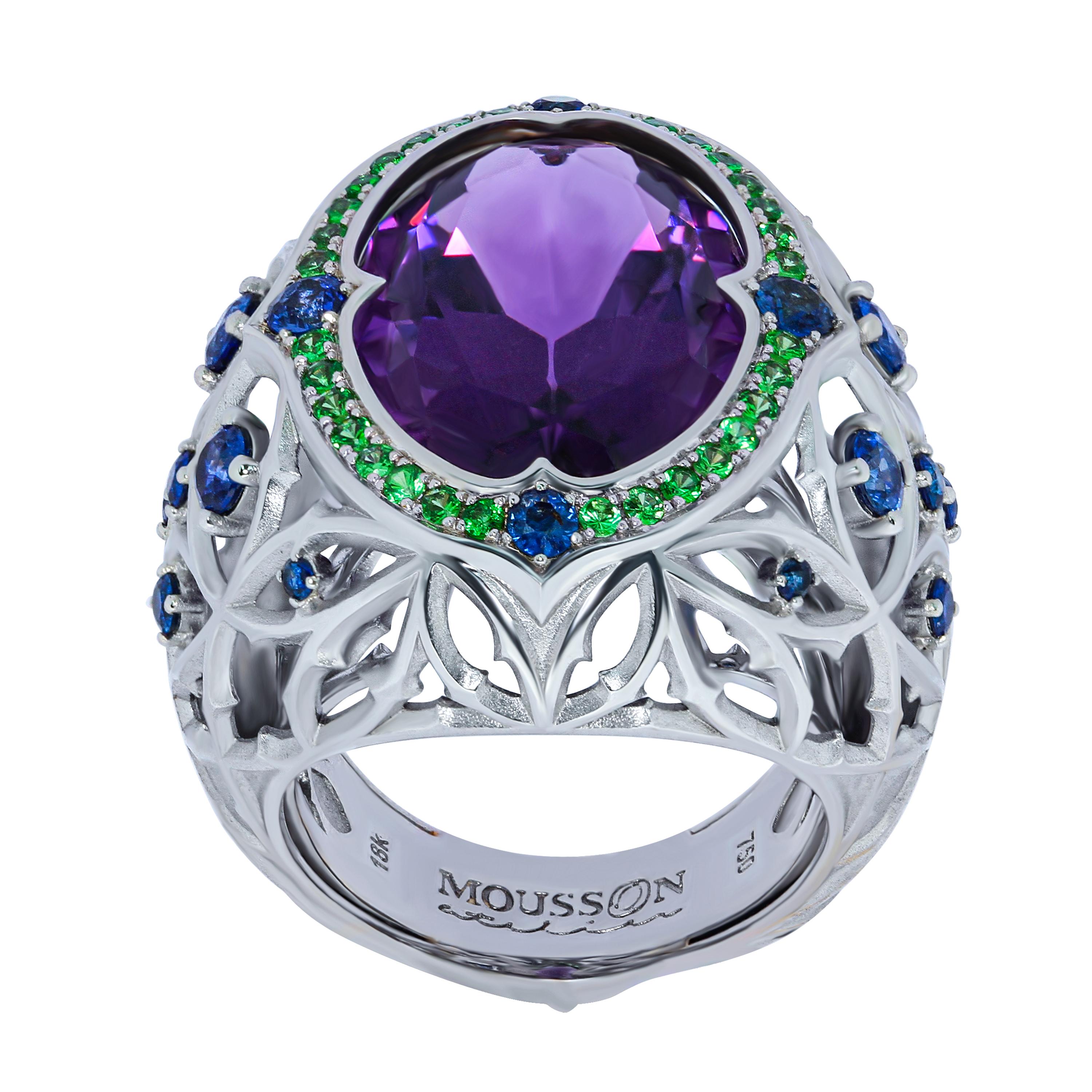 Amethyst 9.29 Carat Blue Sapphires Tsavorites 18 Karat White Gold Gothic Ring
Imagine a Gothic cathedral with all its grace, upward aspiration and colorful stained glass windows. At the idea of this collection, our designers were inspired by all