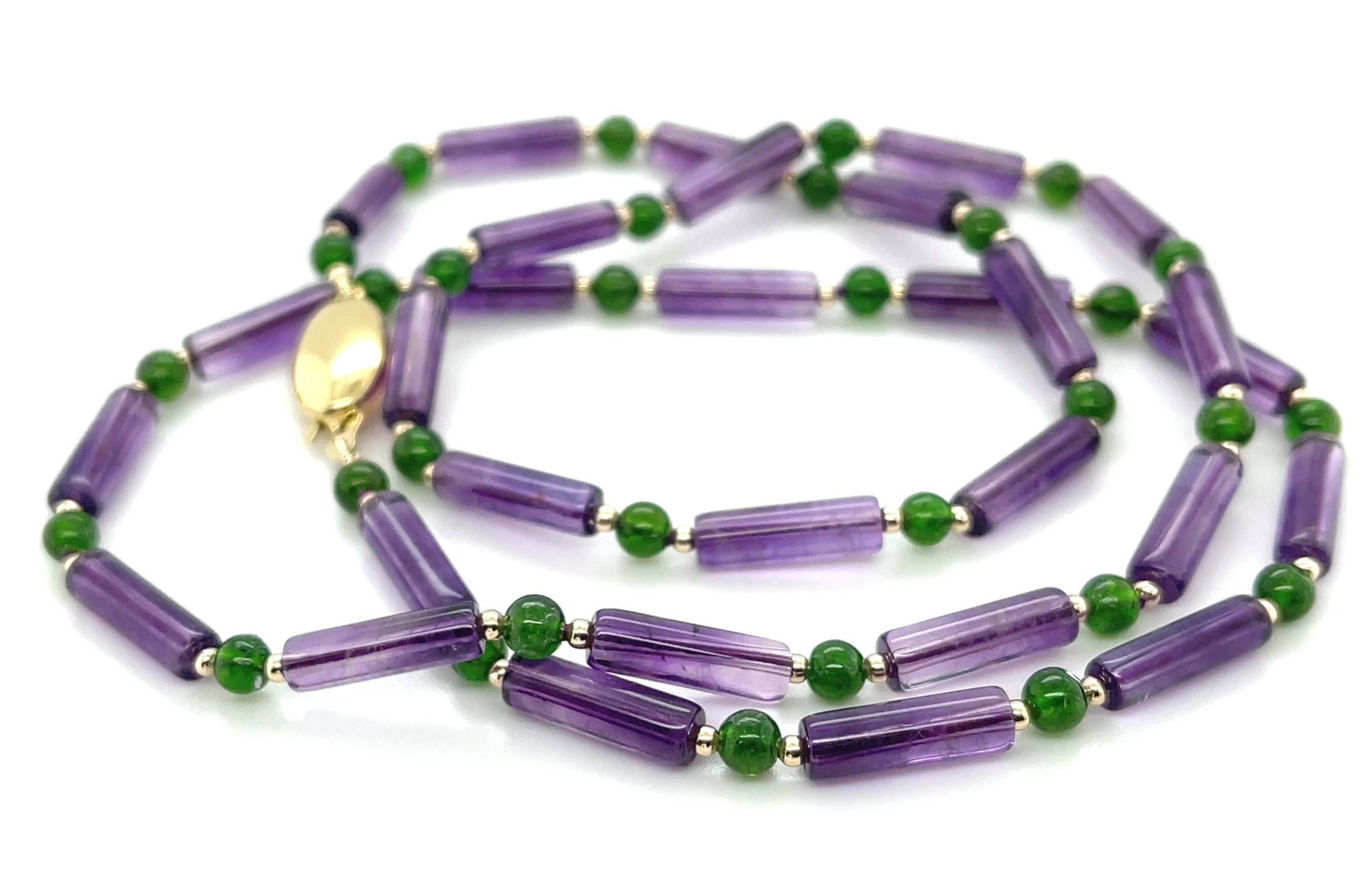 Lovely purple amethyst is paired with bright chrome diopside in this colorful beaded necklace that can be easily dressed up or down! The slender amethyst have beautiful color, and their elegant shape provides a gorgeous contrast to the rich green