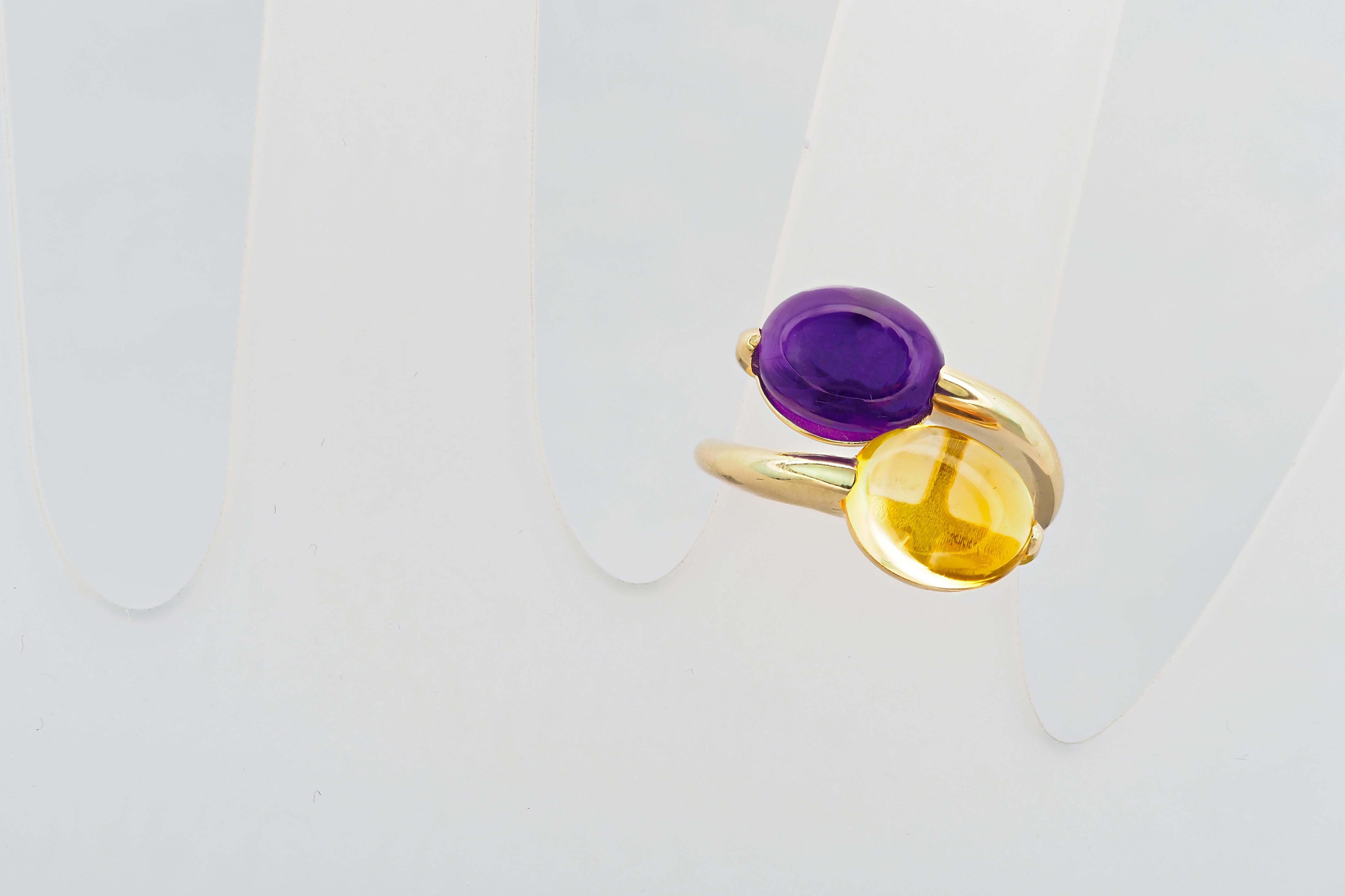 14 kt solid gold ring with natural amethyst and citrine cabochons. February birthstone. November birthstone.
Total Weight: 4 g (+-depends from size)

Gemstones: 
Natural amethyst:
Weight: approx 2.50 ct in total, oval cabochon cut
Clarity: