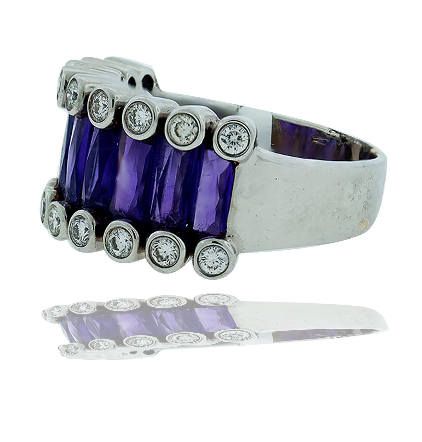 Wide, French Cut Amethyst, Band with Diamonds (18) Diamonds, set in round bezels the diamonds are G-H - VS quality and have a weight of (.035 carats each).60 Carat. Quality supportive ring, Metal is 18K white gold, weight of 11.30 grams.   There is