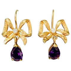 Amethyst and Diamond Bow Dangle Earrings in Yellow Gold