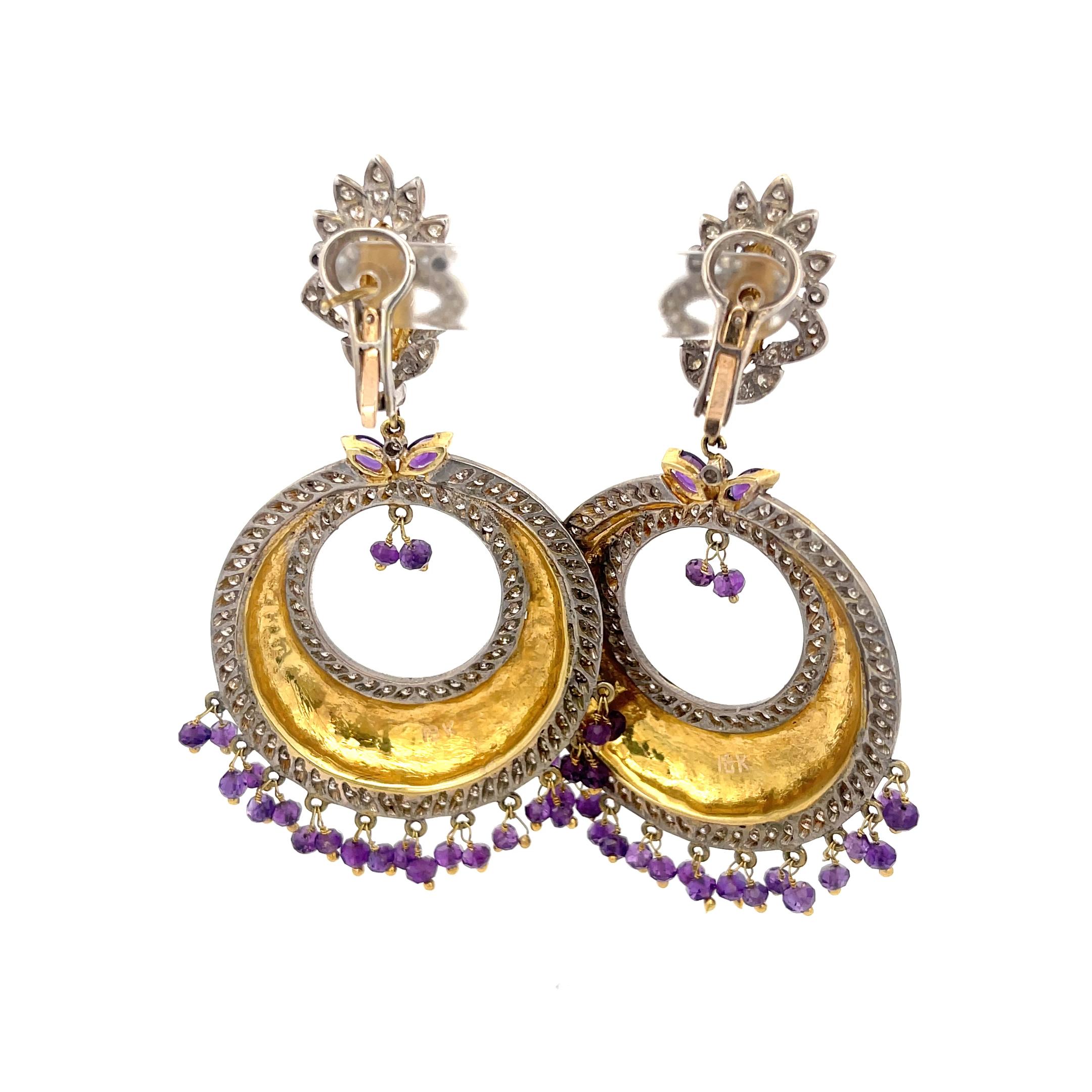 Amethyst and Diamond Dangle Earrings in 18K Yellow Gold. The earrings round cut diamonds and mixed cut amethyst. 
3