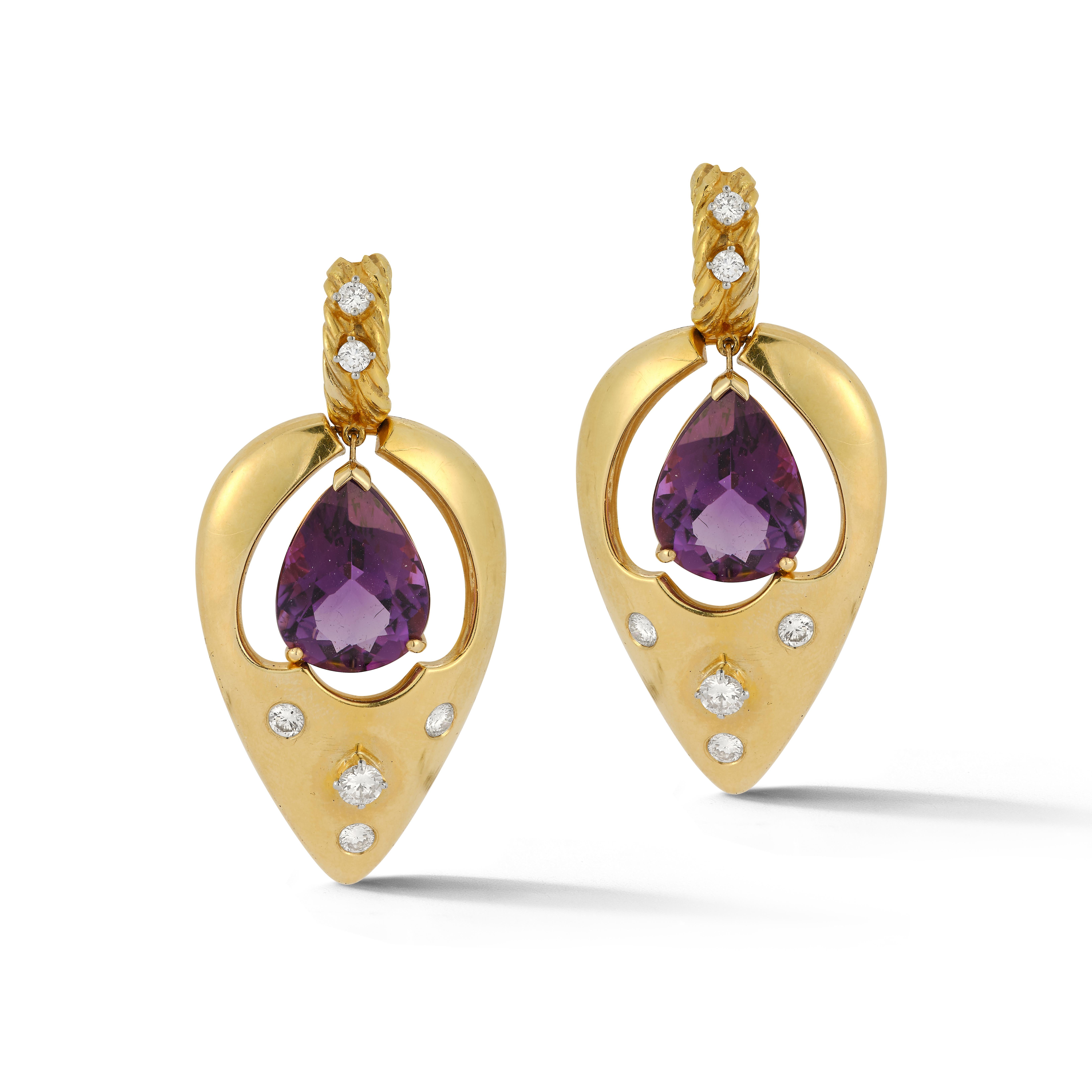 Amethyst & Diamond Gold Dangle Earrings 
2 pear shape amethyst  approx. 18.00 Ct
12 round cut diamonds approx. 1.6ct
set in 14K Yellow Gold 
Back Type: Clip on with post 
26 Grams
Measurements: 2