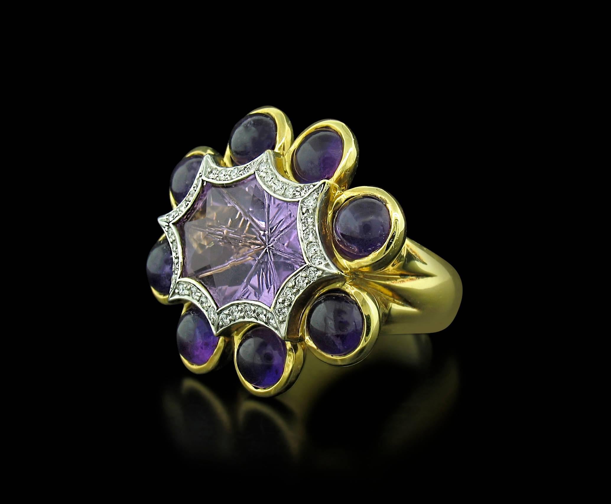 Tony Duquette Amethyst and Diamond Ring in 18K yellow gold features an unusual carved Amethyst in the center surrounded by 8 round, cabochon Amethysts weighing a total of 13.50 carats and accented with 0.23 carats of Diamond pave set in 18k white