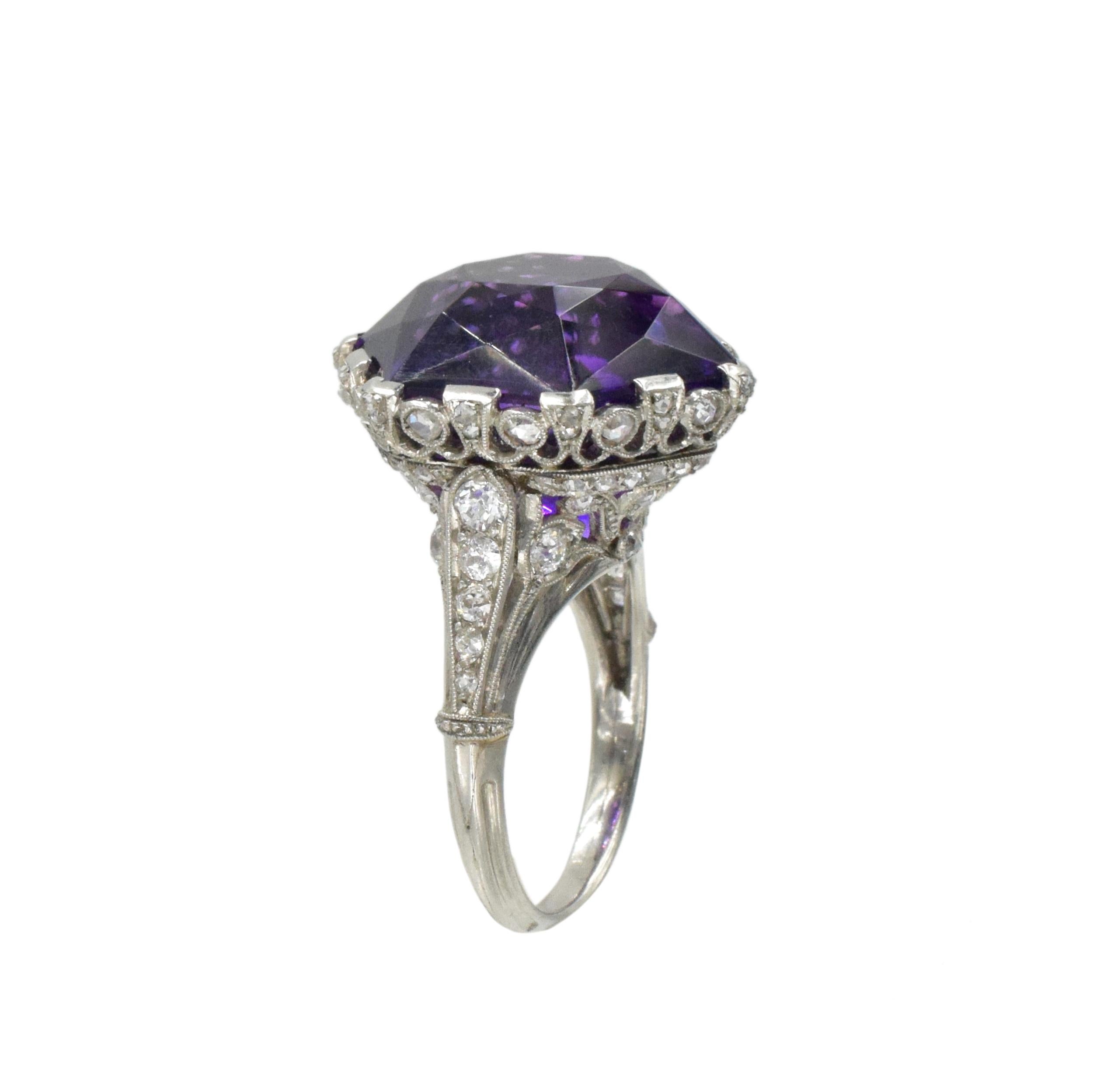 French Amethyst and Diamond Ring This ring is featuring a hexagonal mixed-cut
amethyst with weight of approximately 26.60ct, embellished   by rose-cut and old European-cut
diamonds with a total weight of approximately 0.85ct, set in platinumopenwork