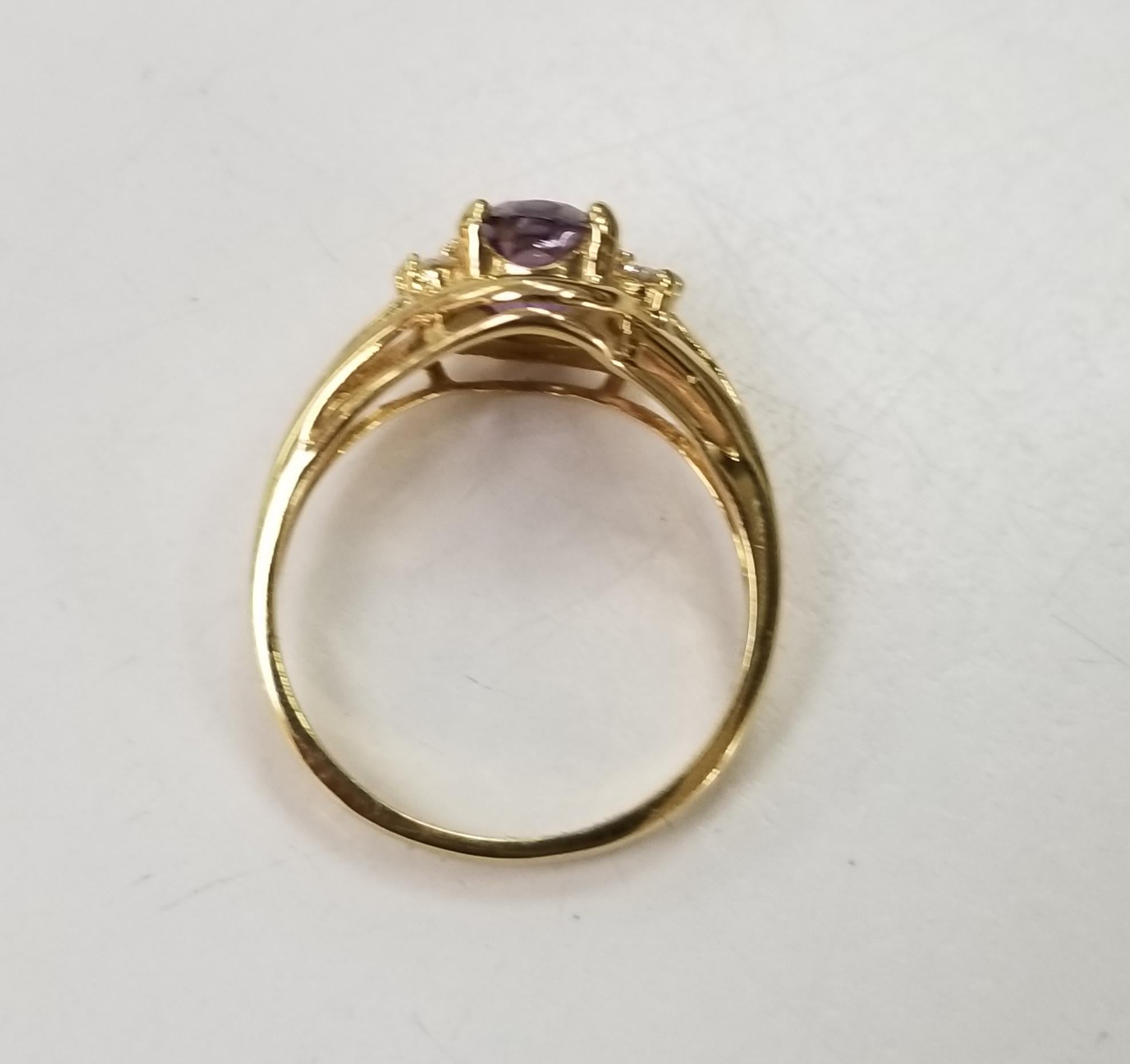 Oval Cut Amethyst and Diamond Ring