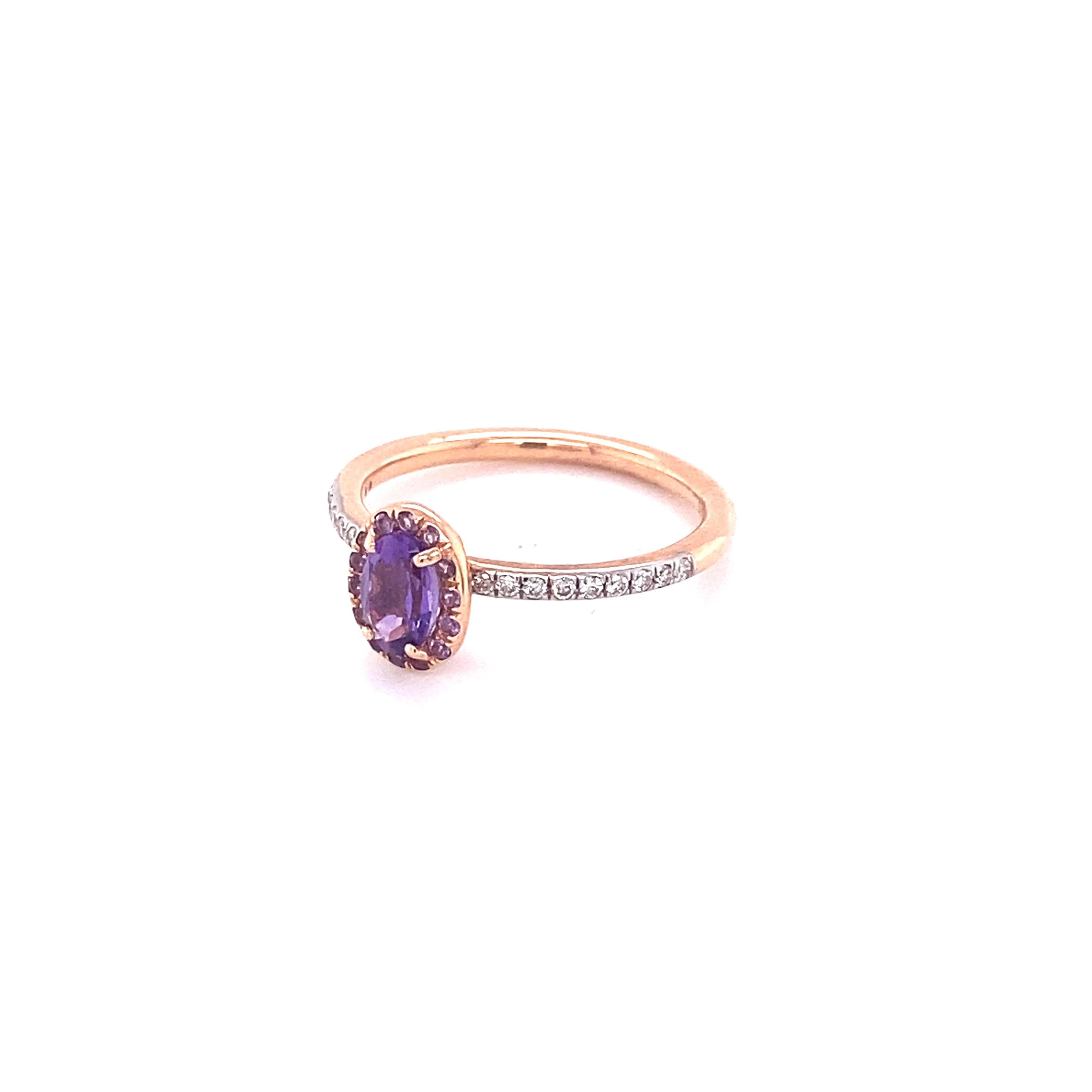 Amethyst Ring with a beautiful purple center stone! That is just the beginning though! The halo also has Amethyst stones, and they do not hide the purple Amethyst center stone still! This ring also has white diamonds on the shank! This ring is