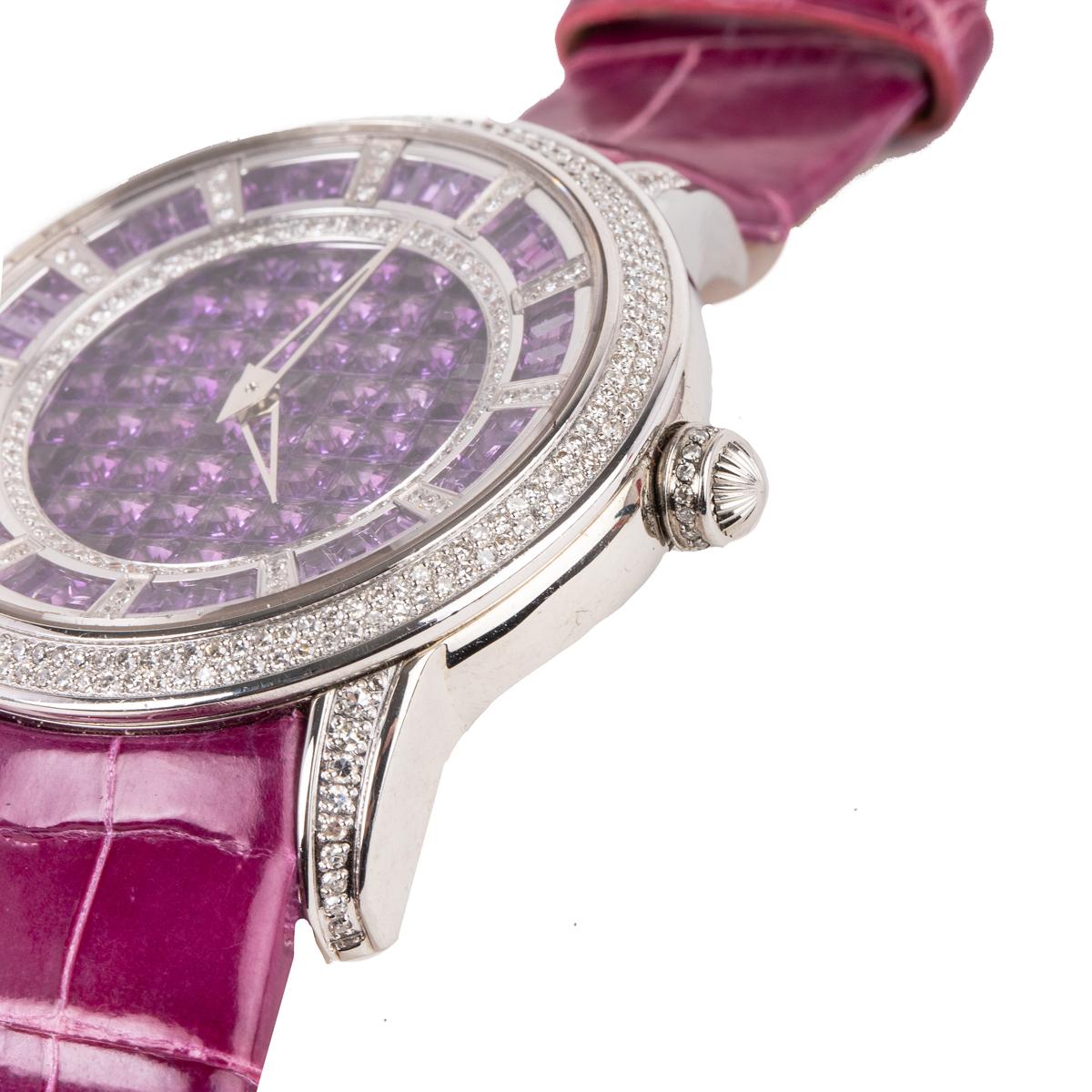 This watch features natural amethyst and diamonds that are precision cut on the entire face of the watch.  This watch features automatic movement and is made with stainless steel and fine leather.