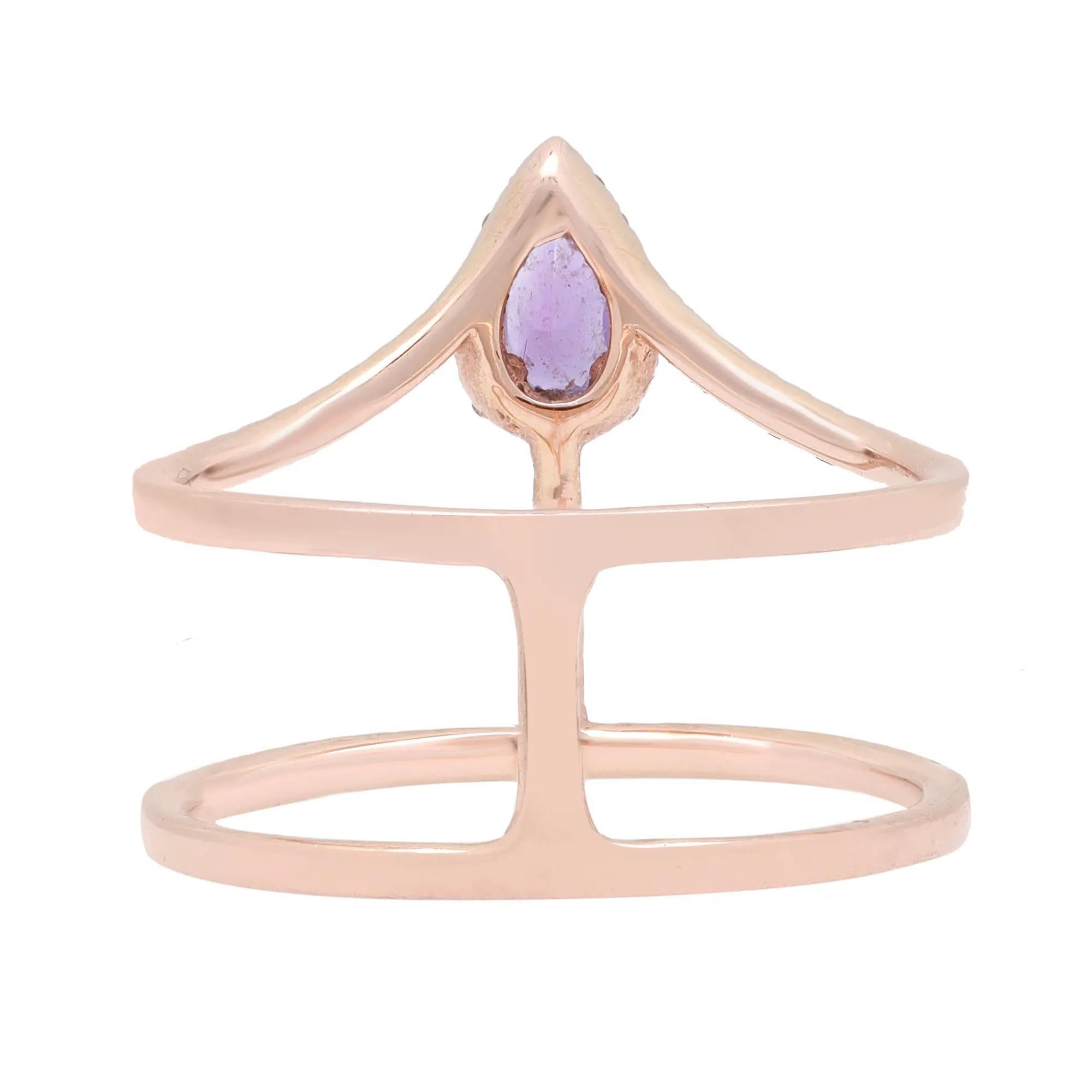 This wide fancy statement ring is crafted in fine 18k rose gold. It features prong set pear shape amethyst with pave set round brilliant cut diamonds. Total diamond weight: 0.26 carat. Ring size: 6.75. Ring width: 9mm - 15mm. Total weight: 2.72