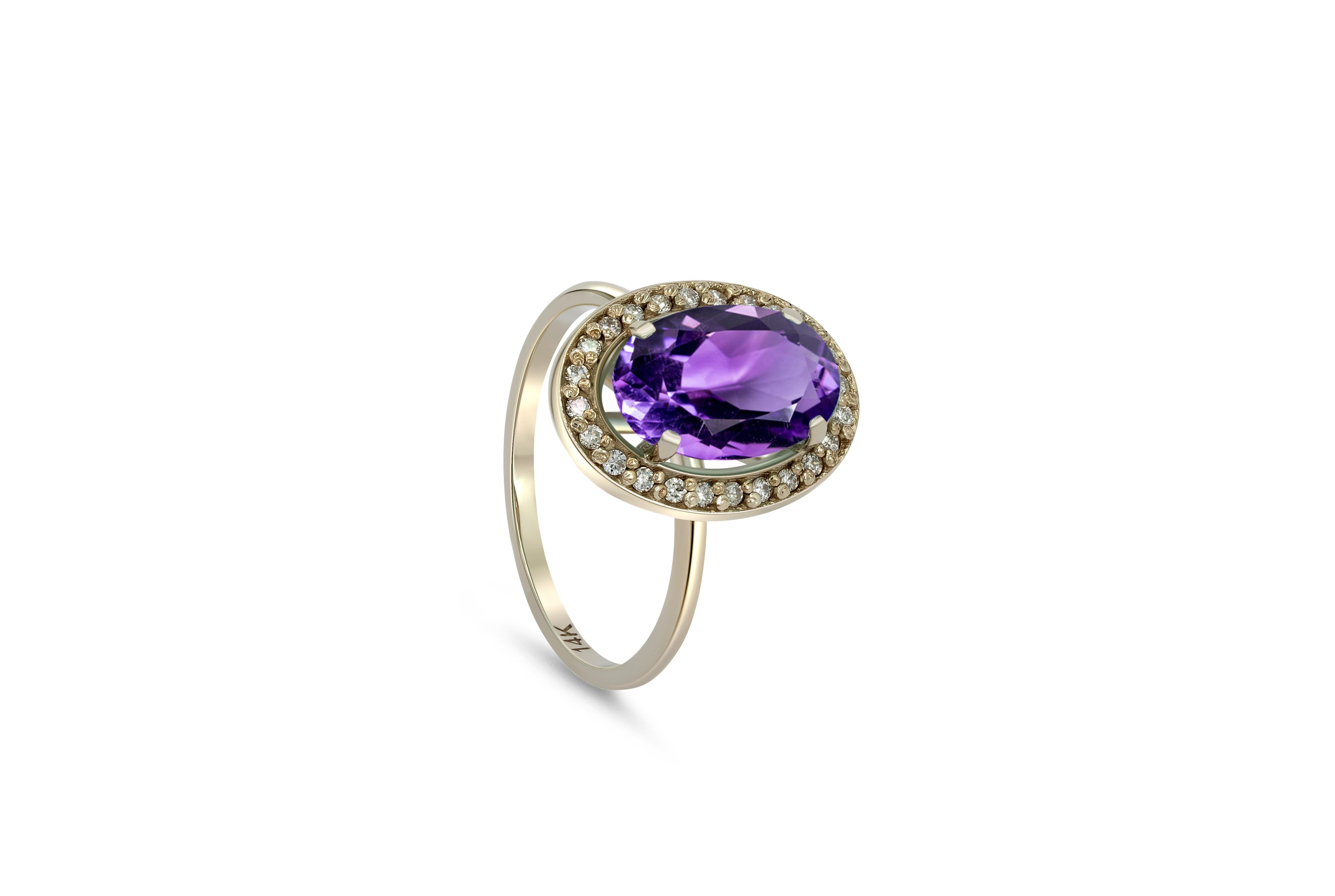Amethyst and diamonds 14k gold ring. 
Oval Amethyst gold ring. Amethyst diamond halo ring. Purple gemstone ring.

Metal: 14k gold
Weight: 3 gr depends from size

Gemstones:
Amethyst - 1 piece
Cut - oval
Color - purple
Weight - 3-3.2 ct

Side