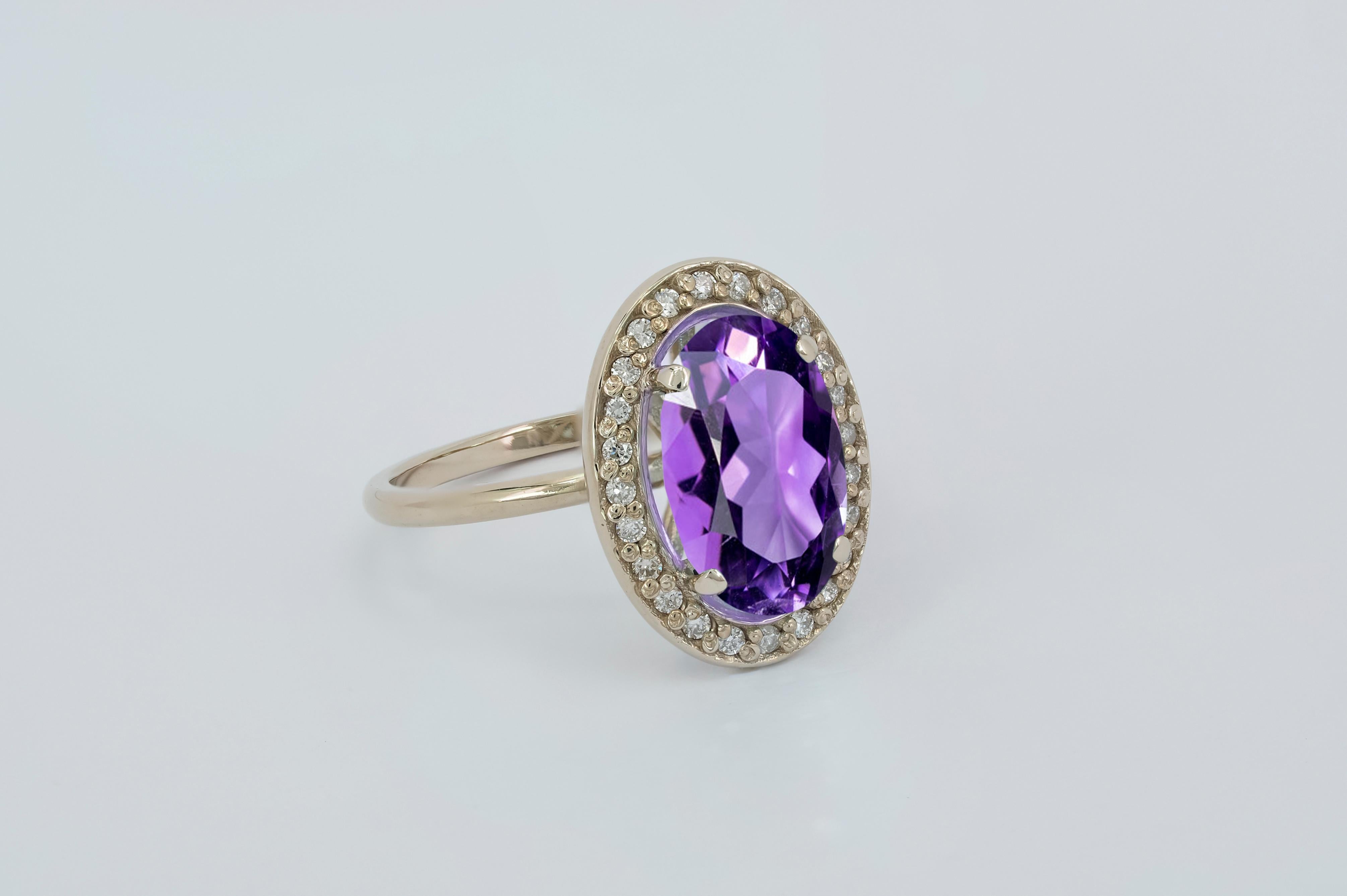Oval Cut Amethyst and diamonds 14k gold ring. 