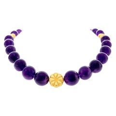 Collana e bracciale con perle d'oro e ametista