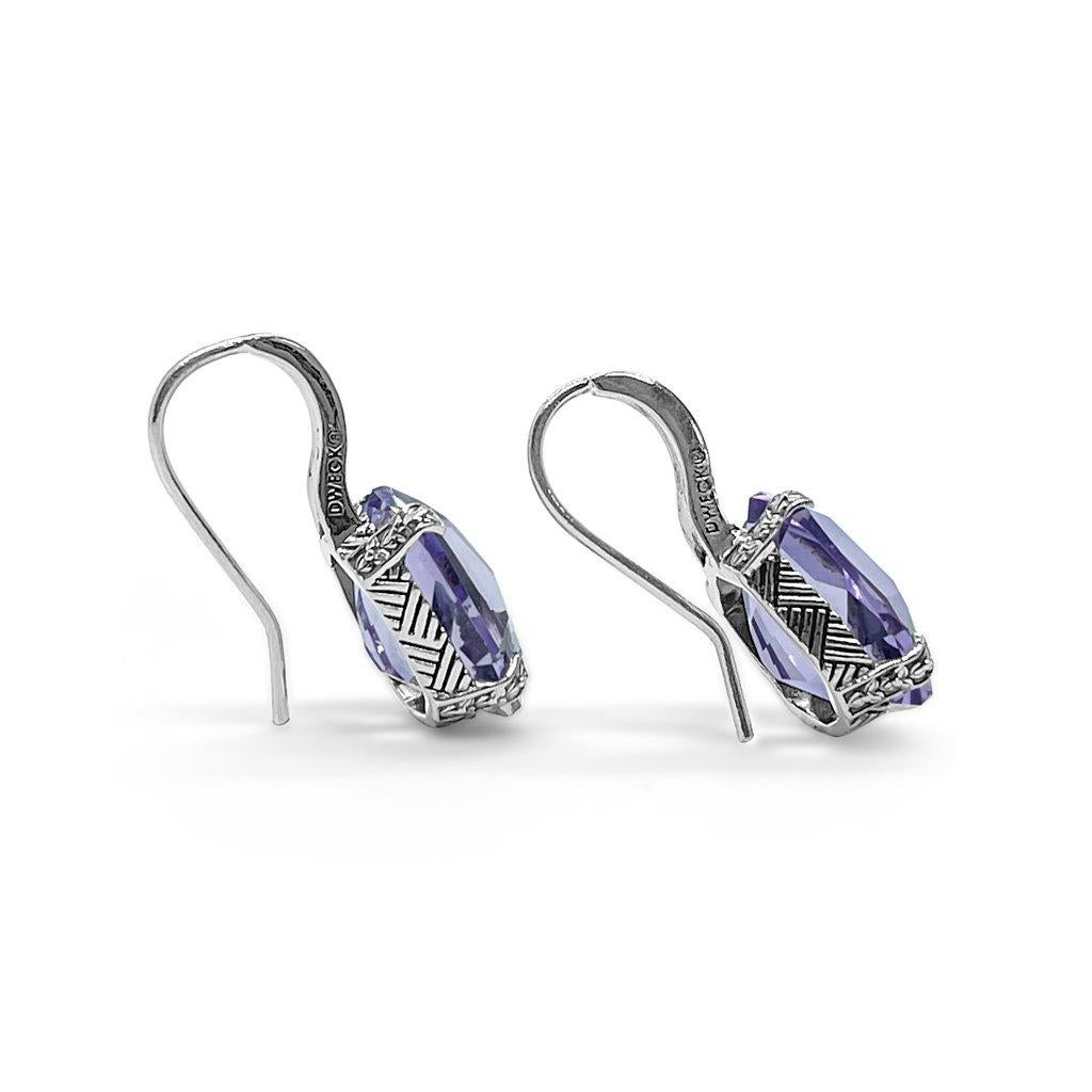 Bold, Unique, and Lively the Amethyst and Lavender Moon Quartz Drop Earrings in Sterling Silver are a versatile pair of earrings that can be worn anywhere the from the home to a night out. This Galactical Drop Earrings in Pink Amethyst & Sterling