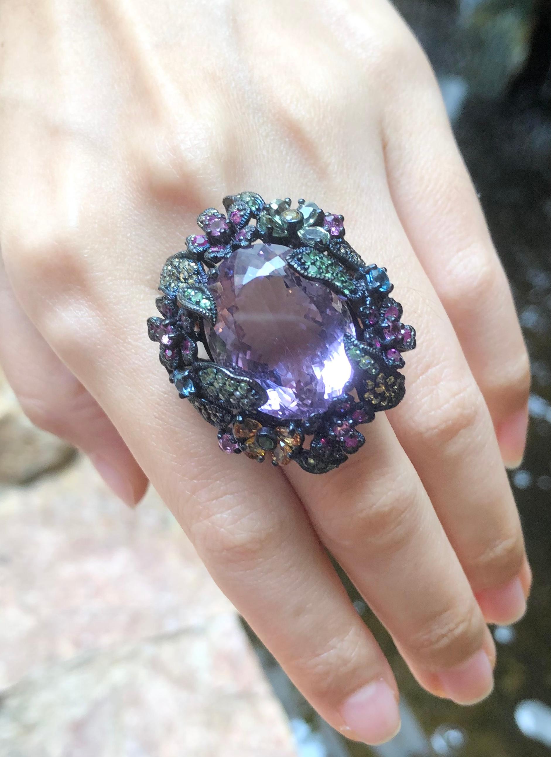 Amethyst and Multi-Color Sapphire, Tsavorite Ring set in Silver Settings

Width:  4.0 cm 
Length: 3.5 cm
Ring Size: 54
Total Weight: 22.71 grams

*Please note that the silver setting is plated with rhodium to promote shine and help prevent