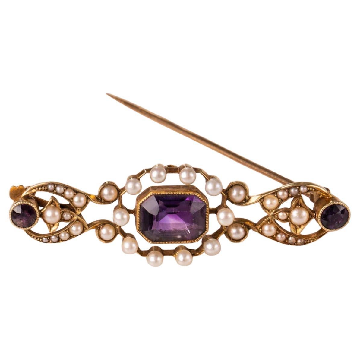 Broche de amatista y perla