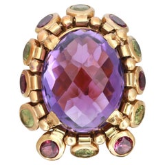 Anello cocktail con ametista e peridoto in oro giallo 18 carati, misura 5,25