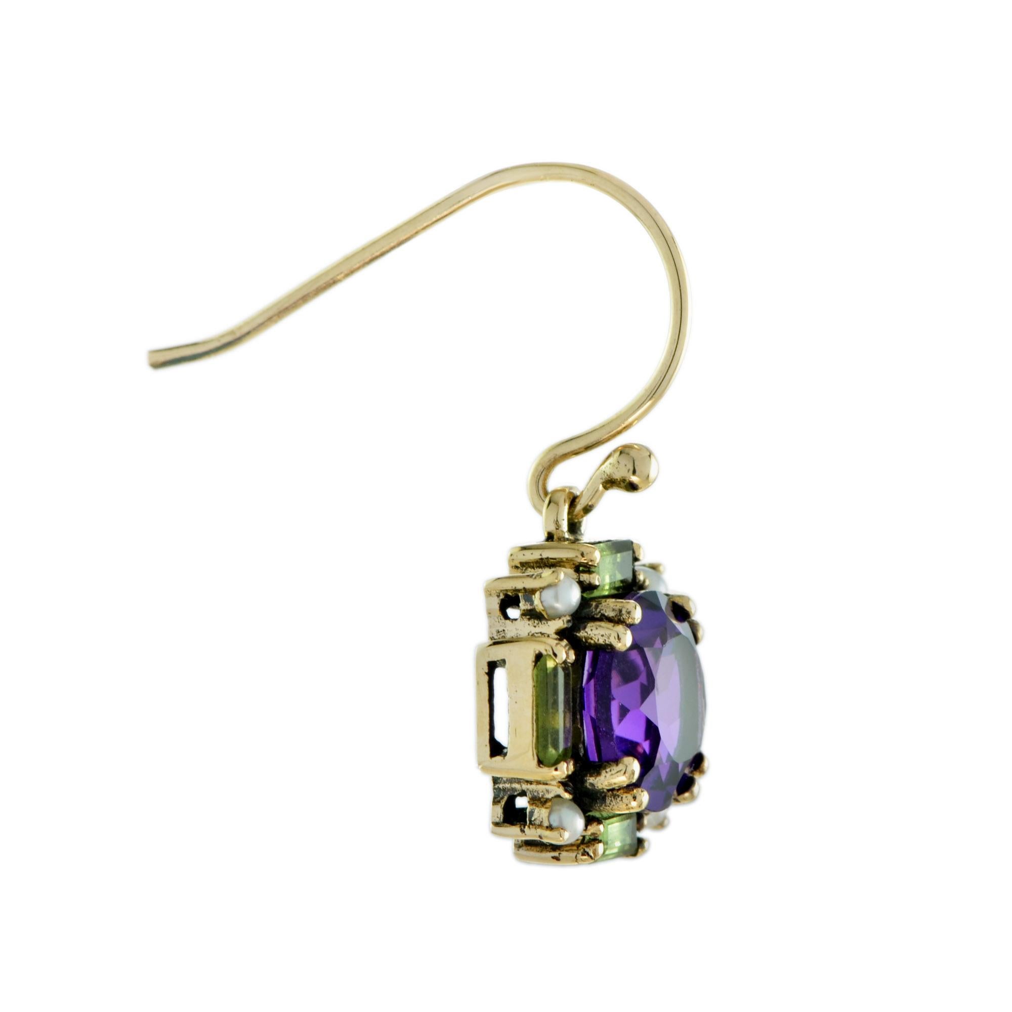 Exquisitely round cut amethyst are handset into 9k yellow gold, bordered by brilliant green baguette cut peridots and pearls. A lovely pair to add colors to your day.

Earrings Information
Metal: 9K Yellow Gold (oxidized)
Width: 12 mm.
Length: 25