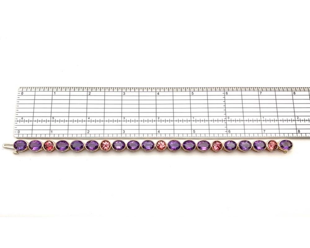 Artisan Amethyst and Pink Tourmaline, Yellow and Rose Gold Bezel Set Tennis Bracelet For Sale