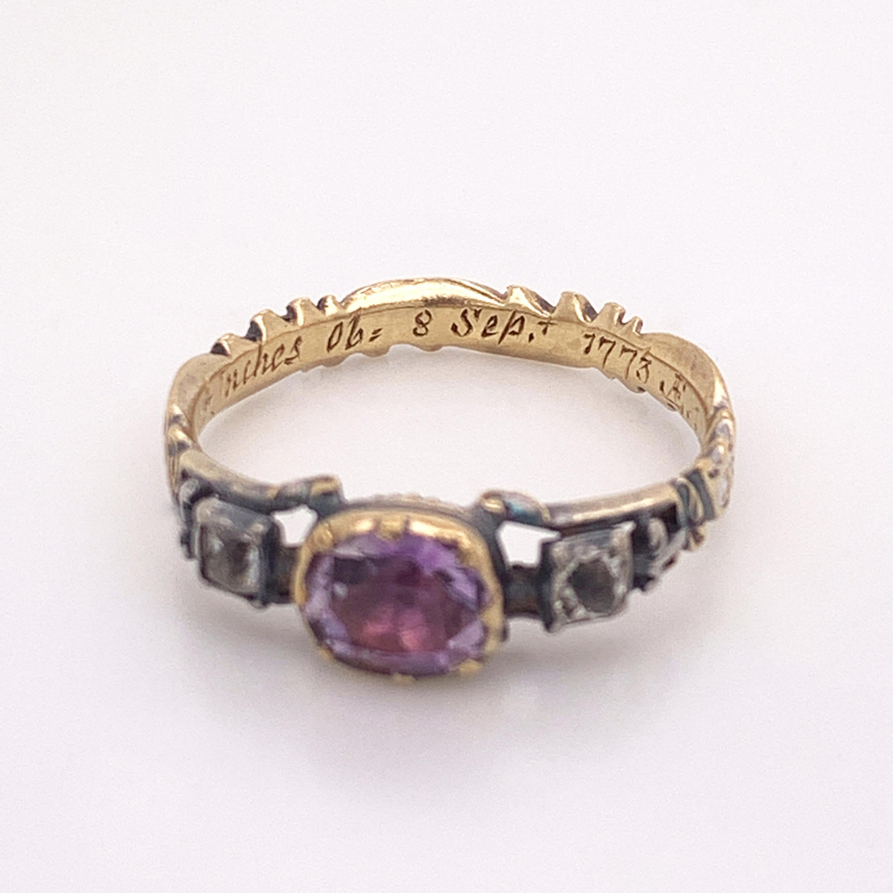 This stunning 18th century Amethyst and Rose-Cut Diamond Ring is an incredible antique discovery. Made in 1773 this ring is truly one of a kind. It features a beautiful royal purple amethyst accompanied by two sparkling rose-cut diamonds. But what