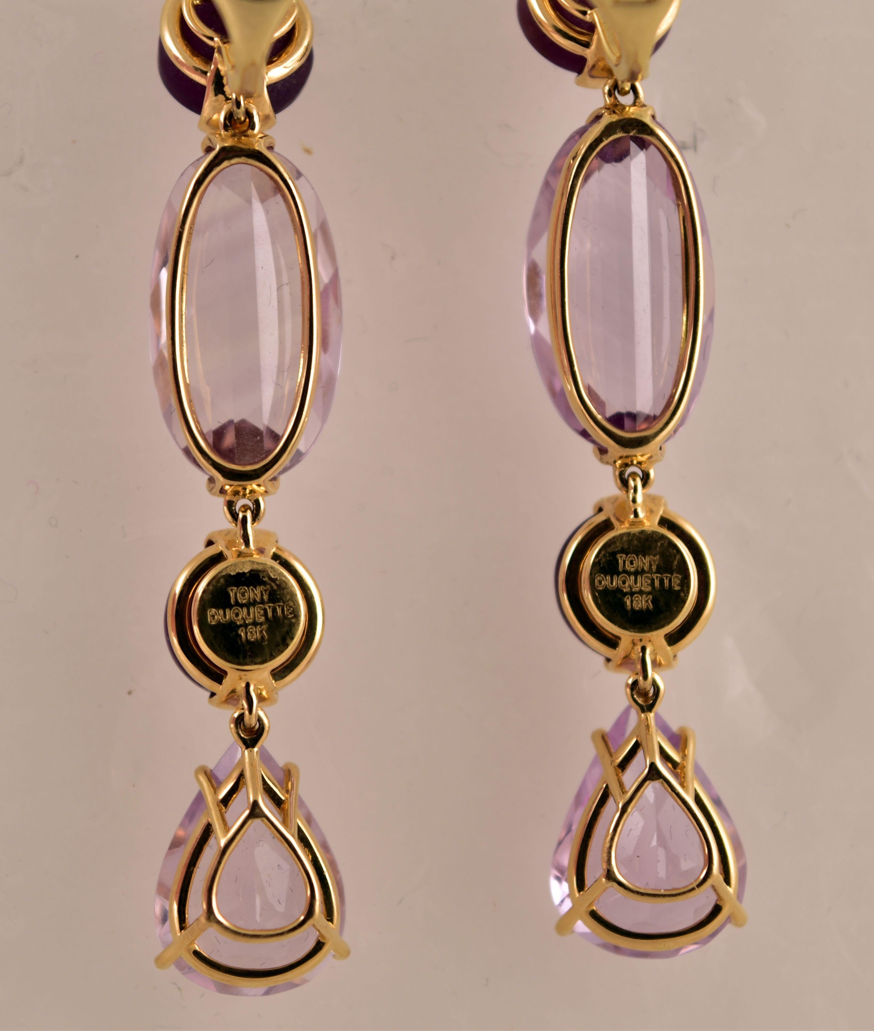 Simply Beautiful! Elegant and Finely detailed Pink Amethyst (app. 26.60 total Carat weight), and Star Ruby (app. 18.60 total Carat weight) Statement Drop Clip-on Earrings. Hand crafted in 18k yellow Gold; Signed: TONY DUQUETTE 18K; measuring approx.