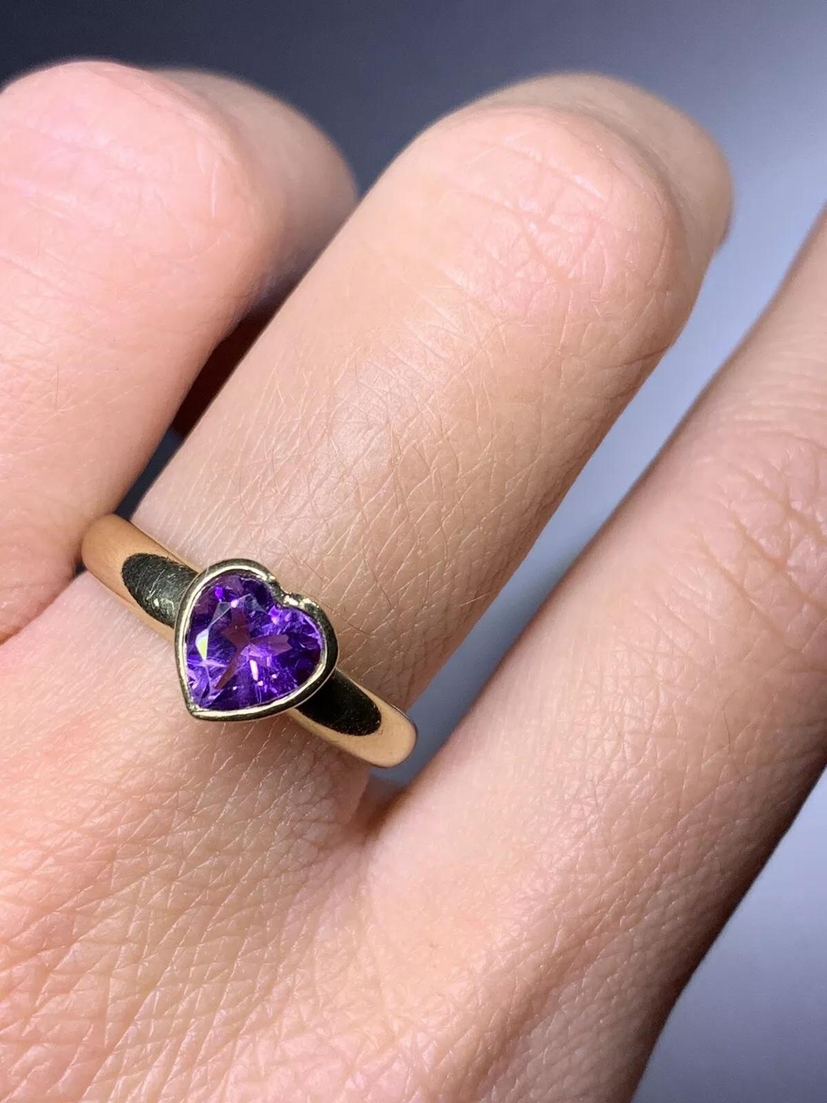 This beautiful ring features a stunning 1.00ct amethyst heart solitaire engagement design, crafted with 9ct yellow gold. The amethyst stone is a natural creation with excellent cut grade and light coloured diamond intensity.


Amethyst antique