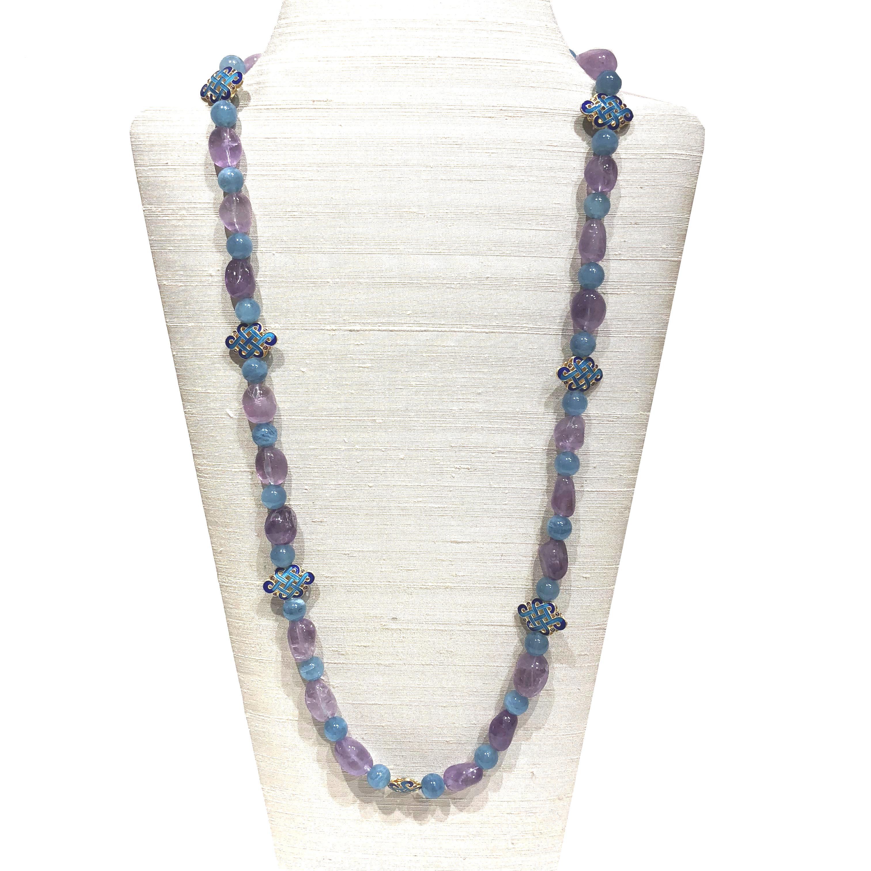 32.25 in (82 cm) long necklace with amethyst, aquamarine and Cloisonné vermeil knot beads 

For those who love Chinoiserie style, the colours of amethyst and aquamarine make a perfect match with the vermeil beads, in the form of endless knots