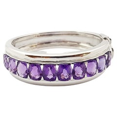 Used Amethyst Bangle set in Silver Settings