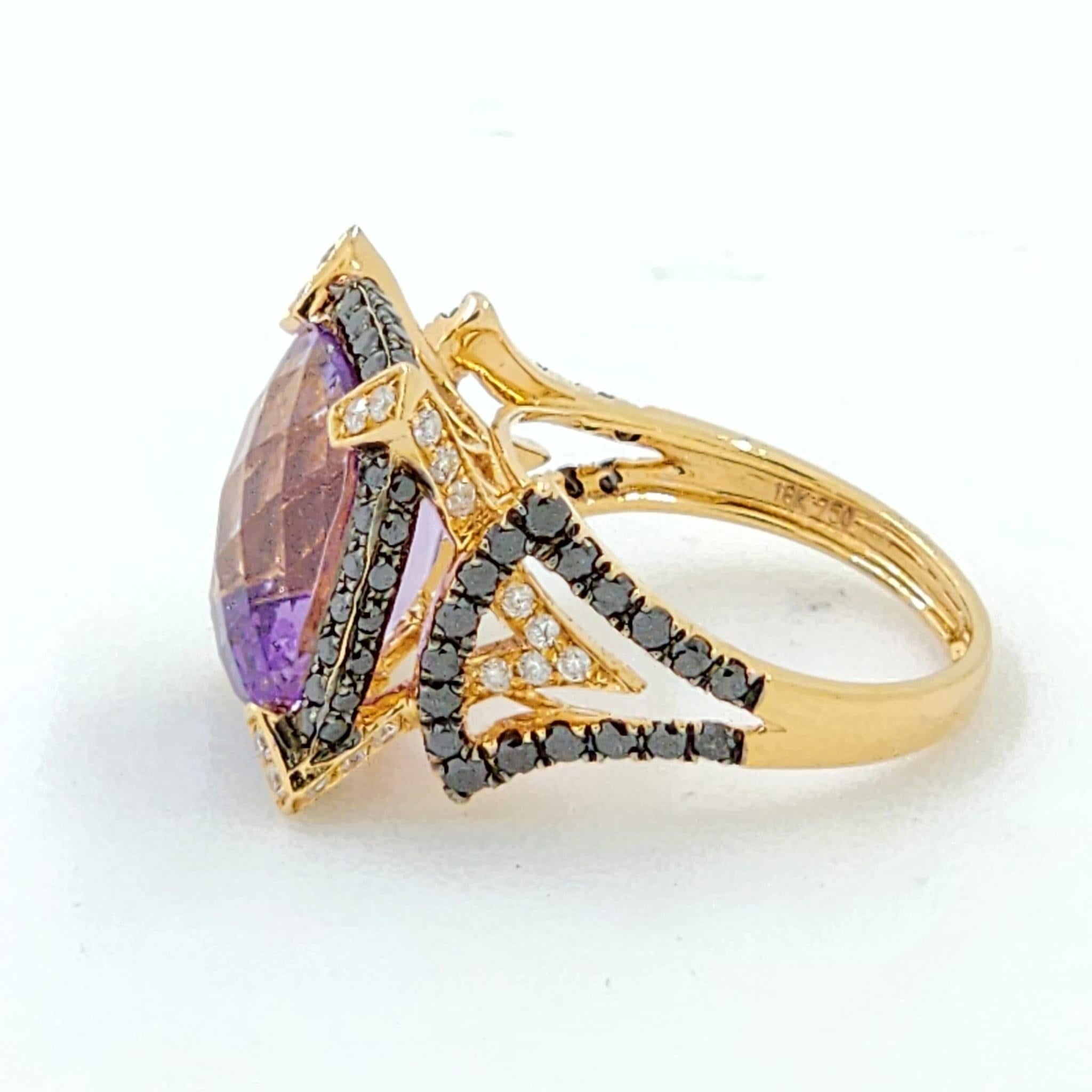 This stunning cocktail ring is a celebration of opulence, fine craftsmanship, and the interplay of colors.

At the heart of the ring lies a magnificent 6.18 carat cushion-cut Amethyst, known for its vibrant purple hue. This Amethyst, with its depth