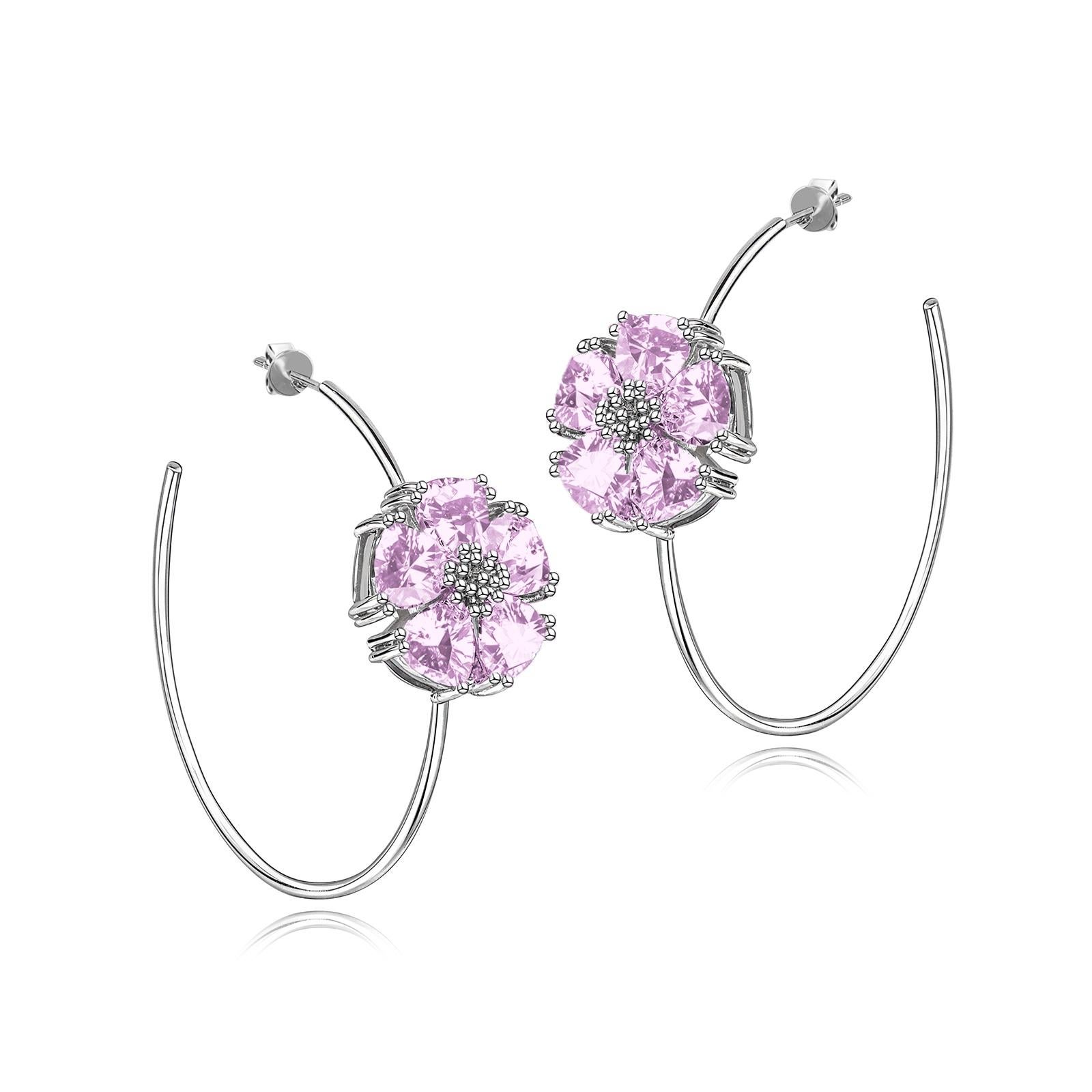 Designed in NYC

.925 Sterling Silver 2 x 20 mm Amethyst Blossom Stone Open Hoops. No matter the season, allow natural beauty to surround you wherever you go. Blossom stone open hoops: 

Sterling silver 
High-polish finish 
Light-weight 
2 x 20 mm