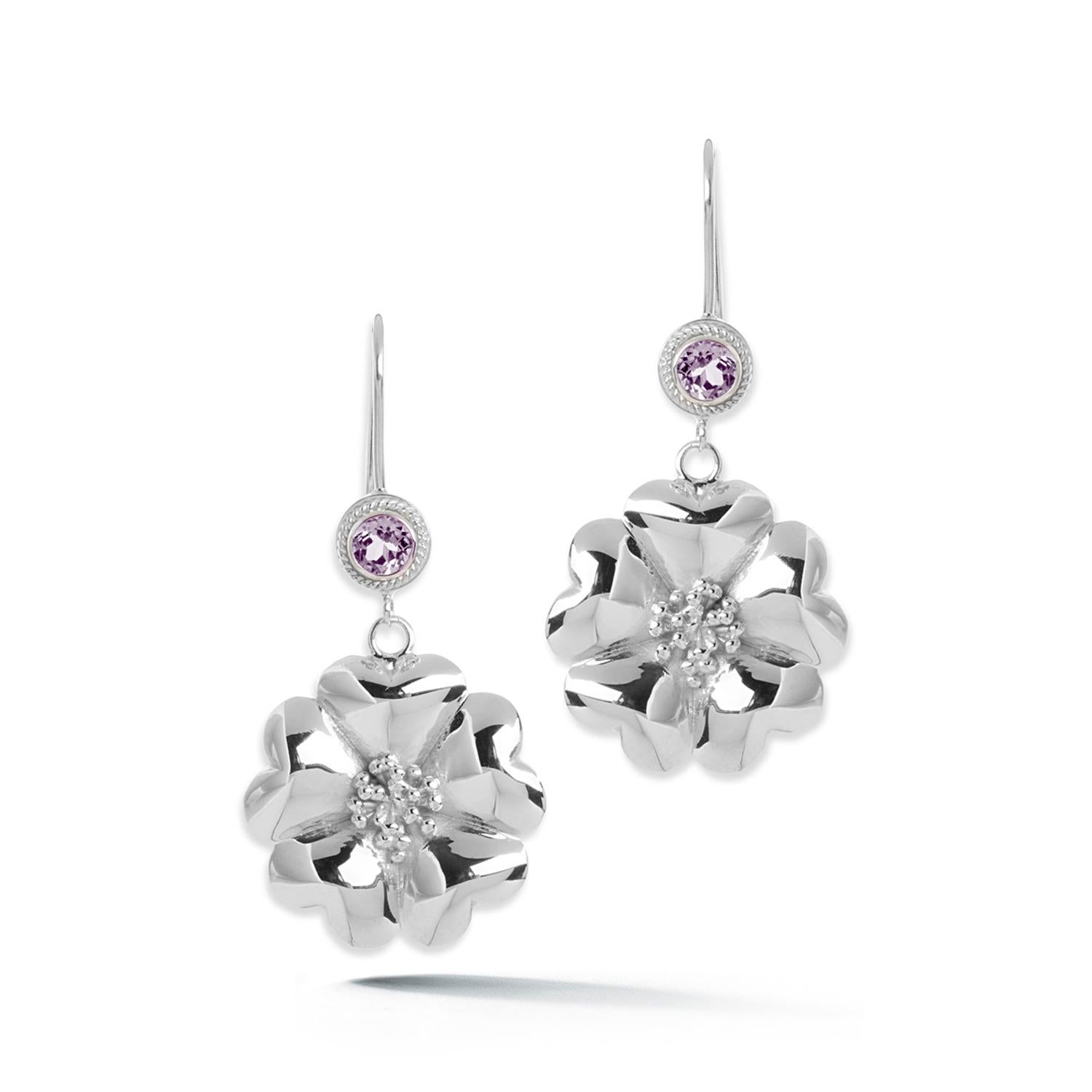 Designed in NYC

.925 Sterling Silver 2 x 5 mm Amethyst Blossom Stone Wire Hook Earrings. No matter the season, allow natural beauty to surround you wherever you go. Blossom stone wire hook earrings: 

Sterling silver 
High-polish 
Light-weight 
5mm